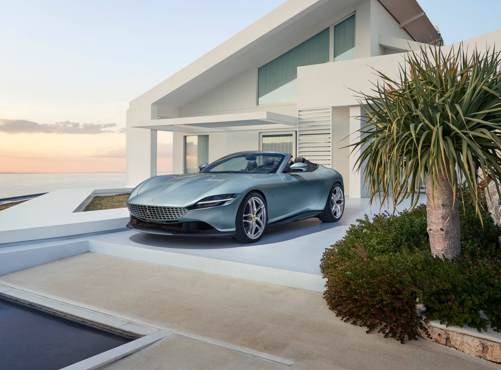 2025-2026 Ferrari Roma Spider top down in blue front angled view