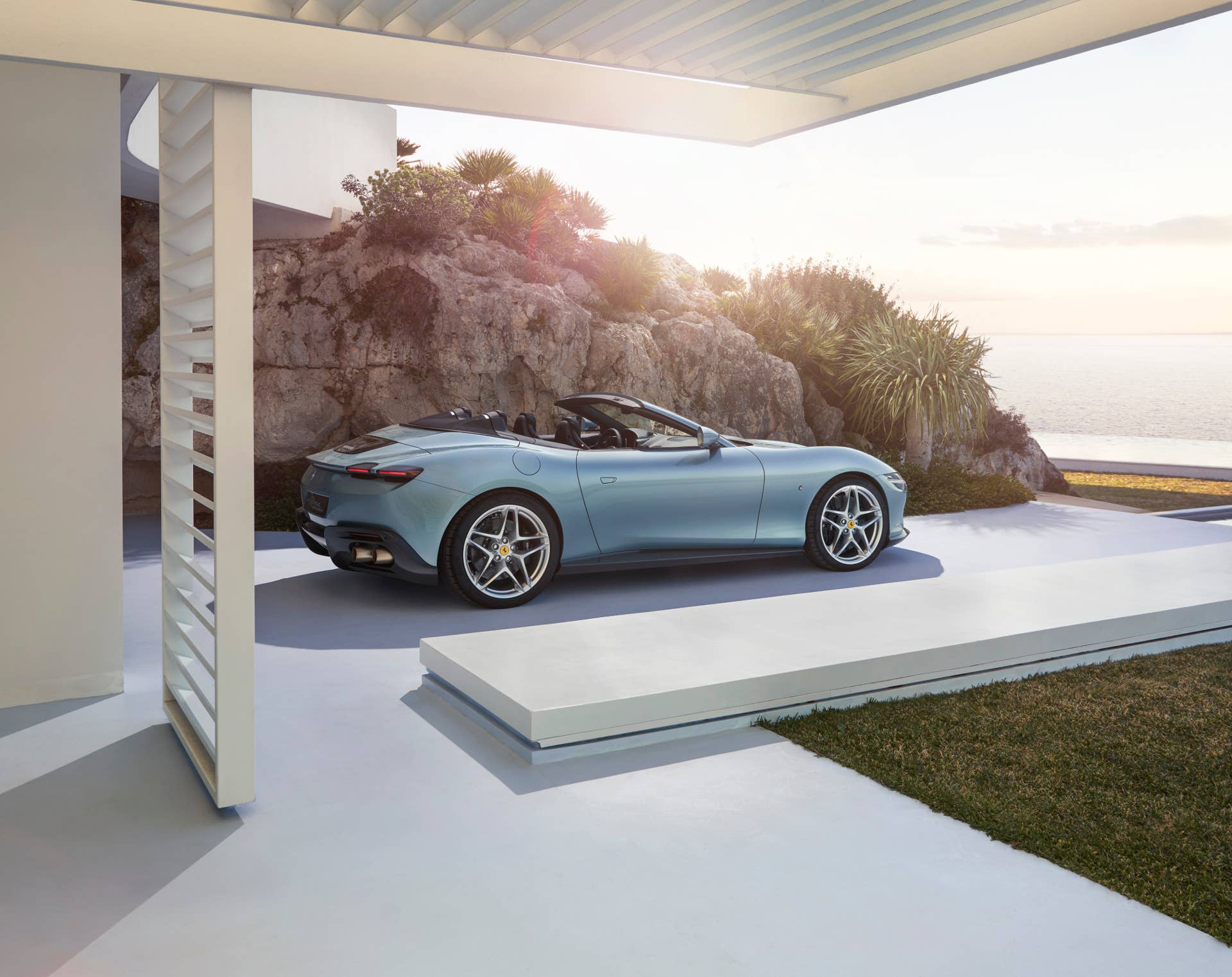 2025-2026 Ferrari Roma Spider top down in blue side view
