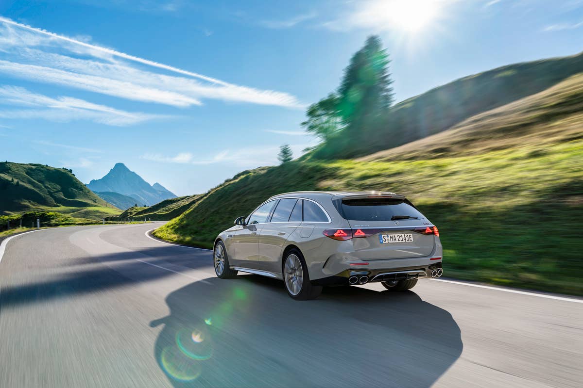 2026 Mercedes-AMG E 53 Hybrid Wagon in gray rear angled view driving
