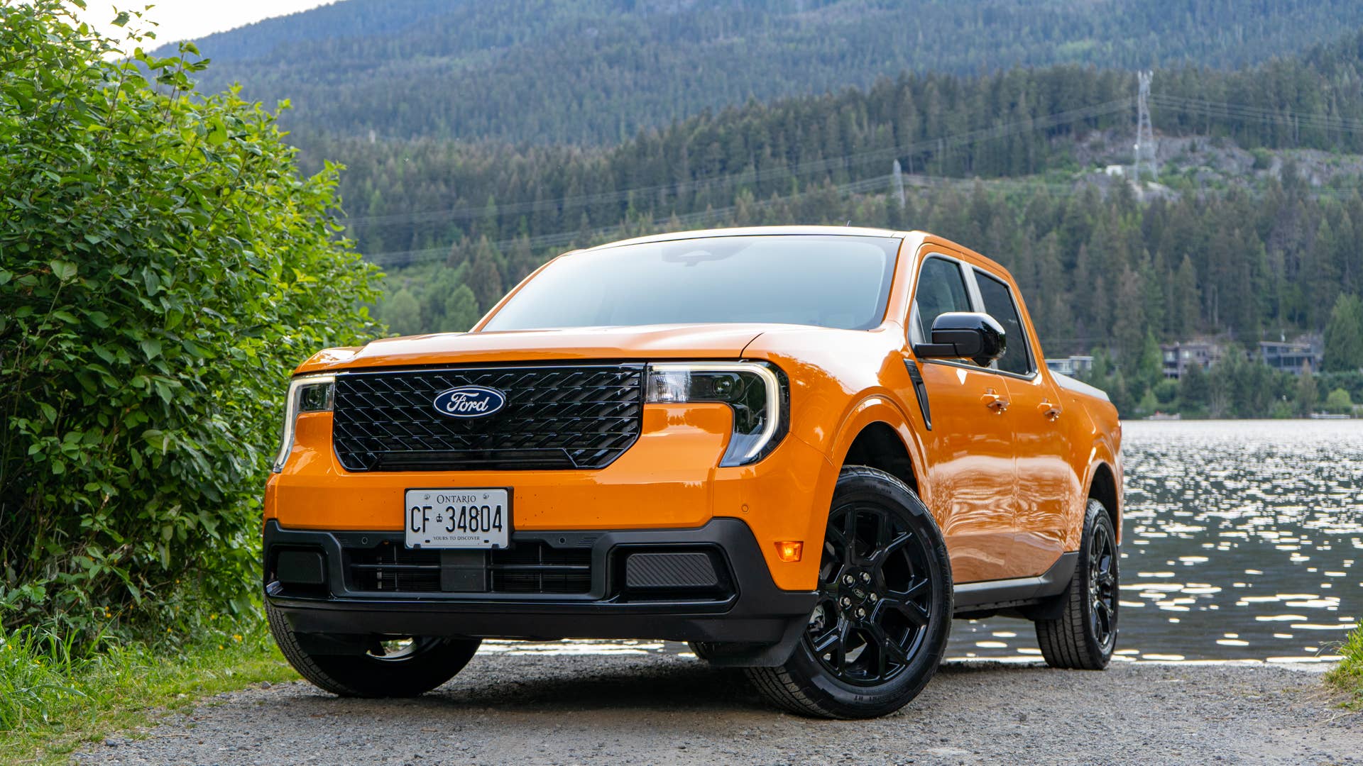 2026 Ford Maverick Lariat Hybrid in Orange Fury front angled view