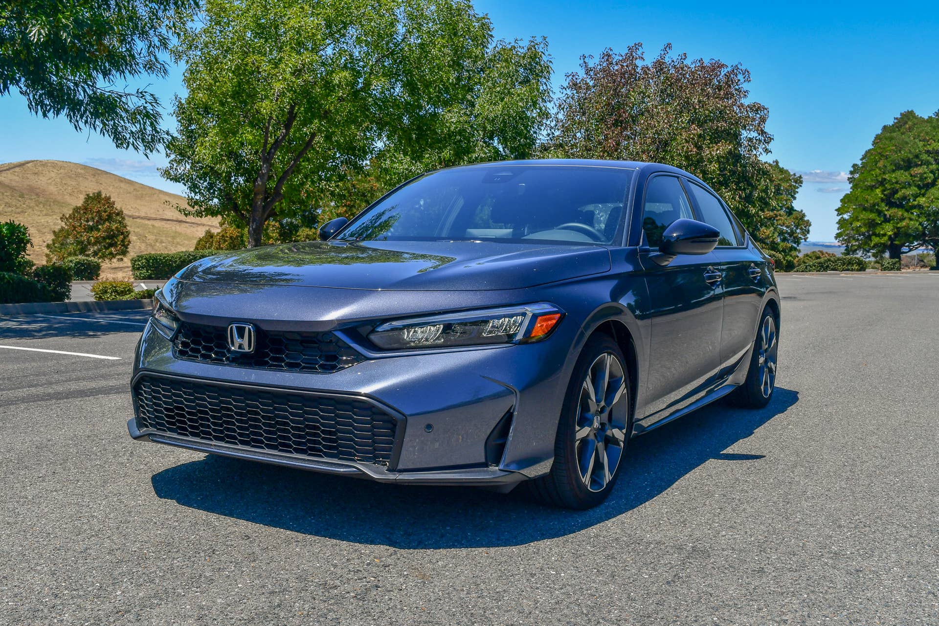 The front quarter end of the 2026 Honda Civic Hatchback Hybrid