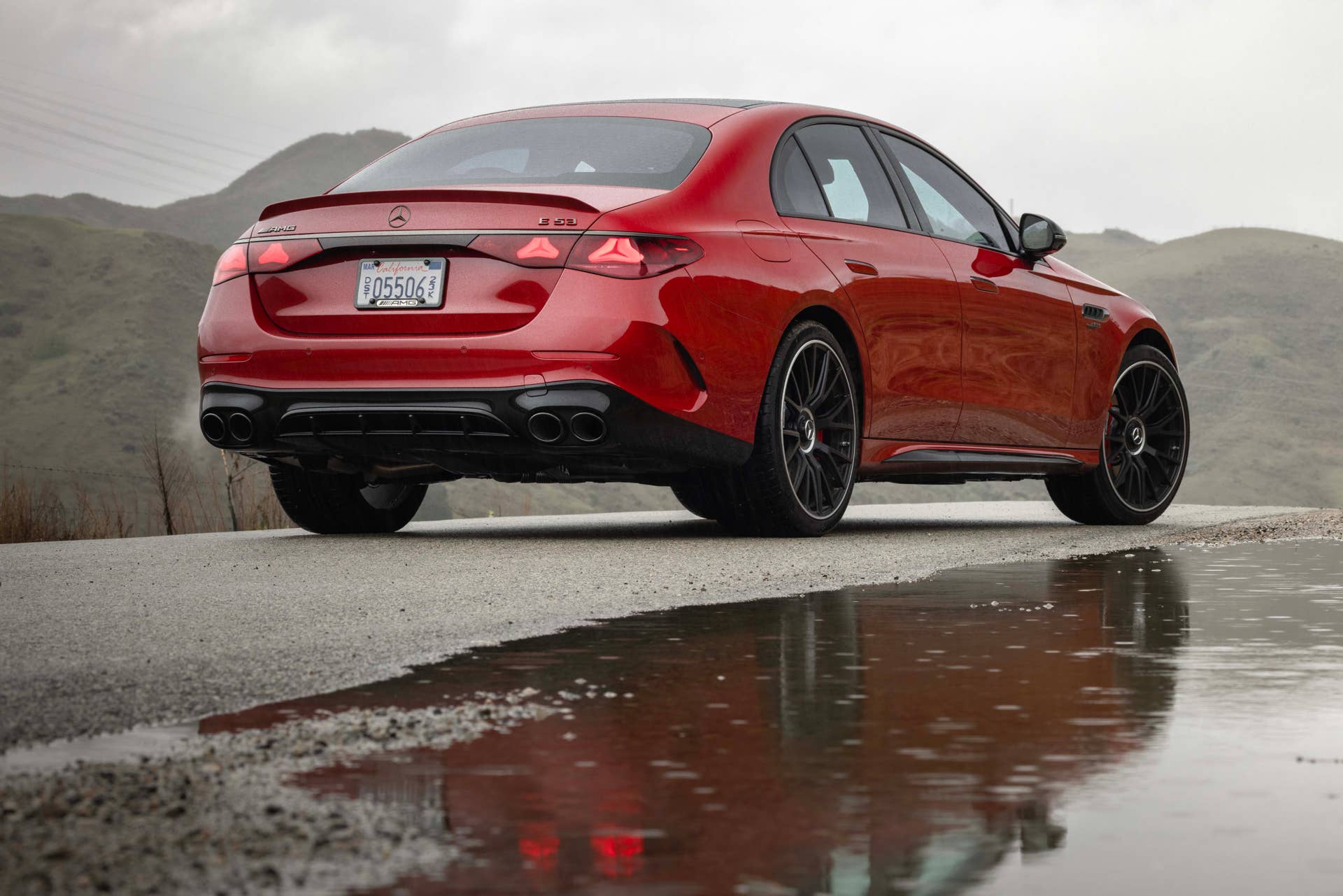 2026 Mercedes-AMG E 53 Sedan in Manufaktur Patagonia Red rear angled view