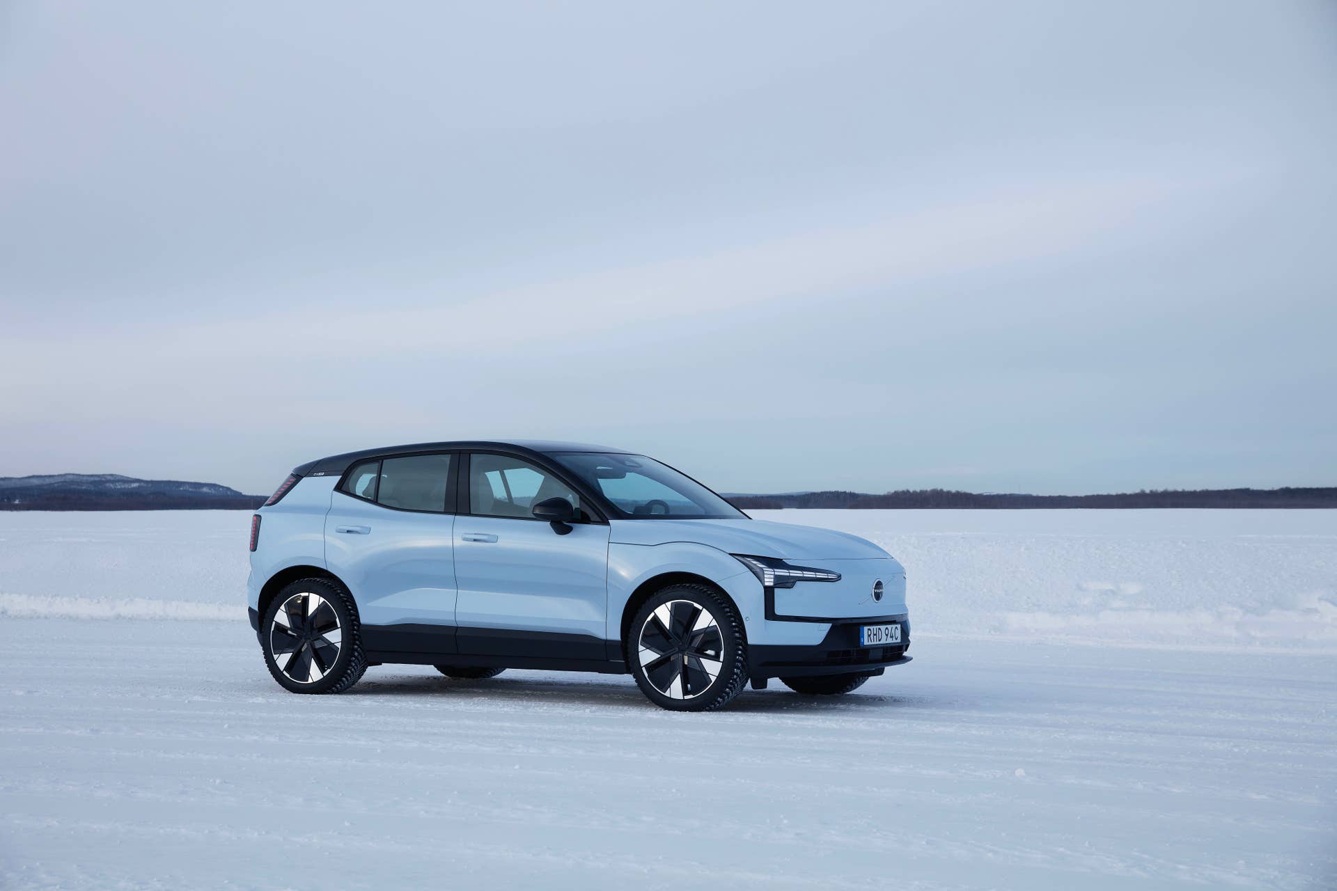 2025-2026 Volvo EX30 in Cloud Blue front angled view on snow