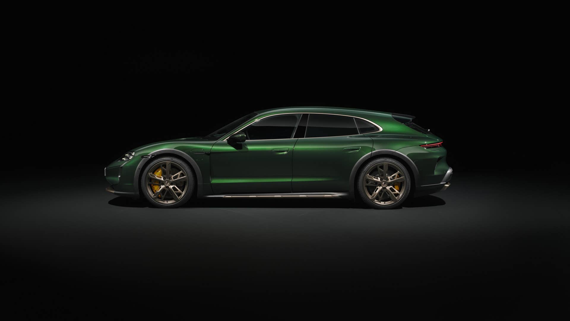 2026 Porsche Taycan Turbo Cross Turismo in green side view