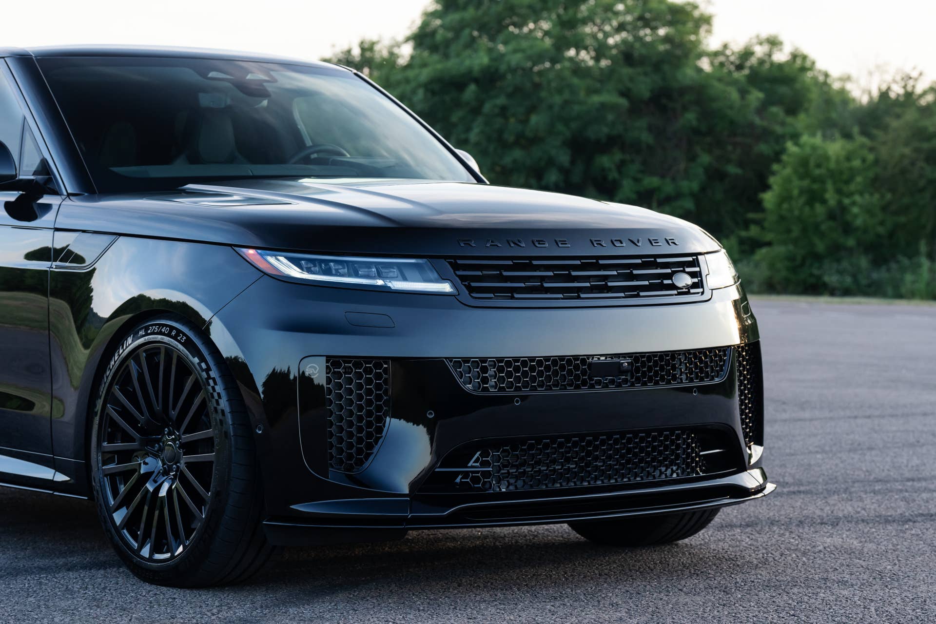 2026 Land Rover Range Rover Sport SV Black in Narvik Black front angled view closeup