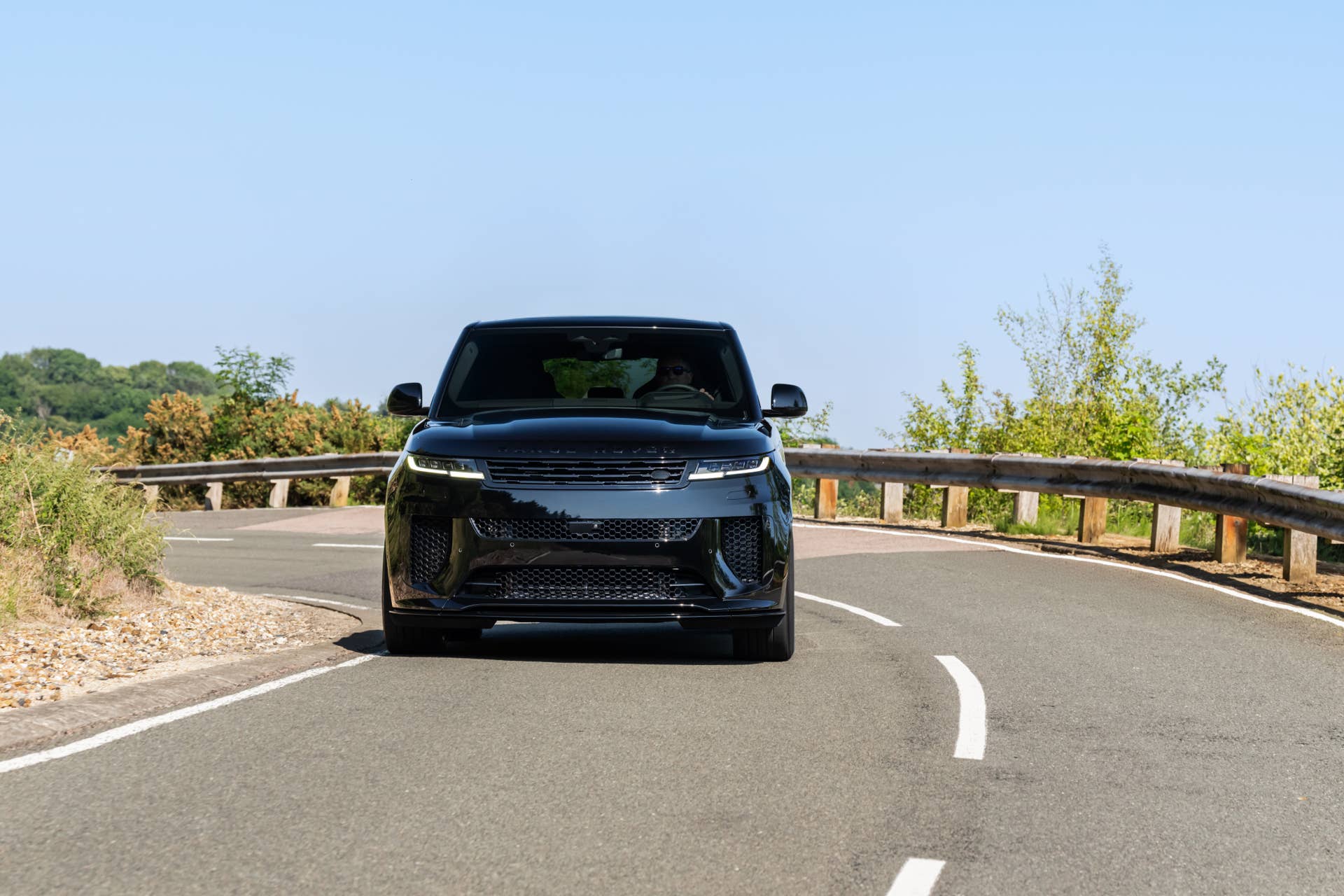 2026 Land Rover Range Rover Sport SV Black in Narvik Black front view driving