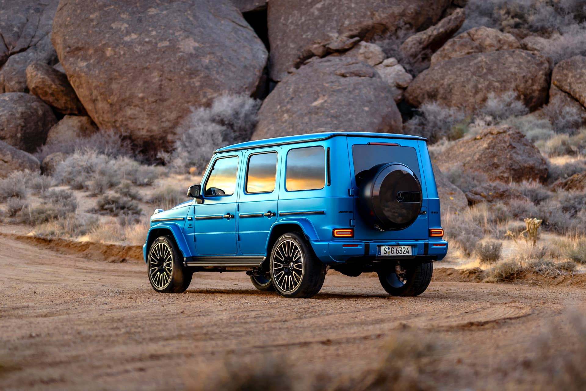 2025-2026 Mercedes-AMG G 63 in Manufaktur Hyper Blue Magno rear angled view
