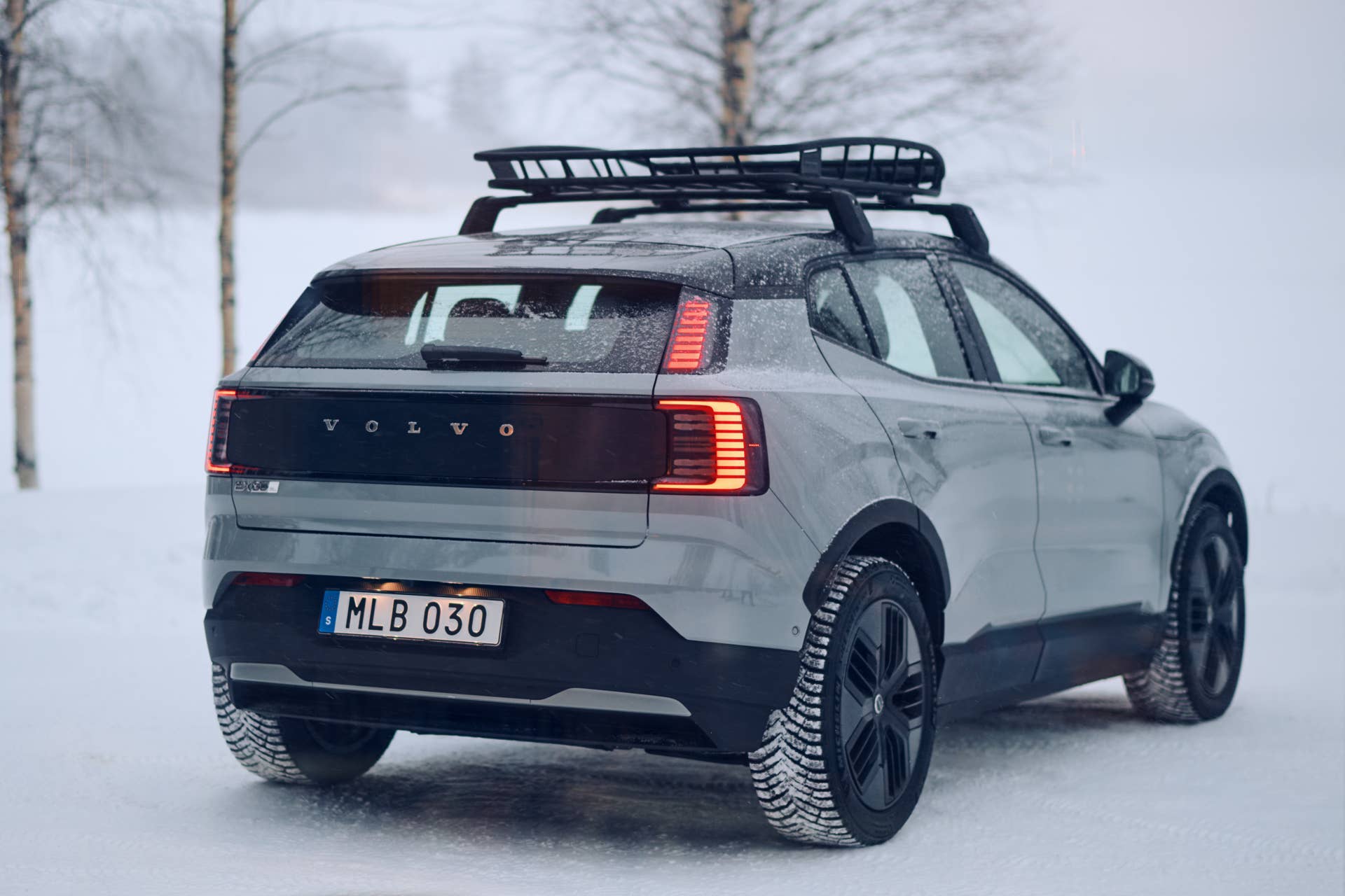 2026 Volvo EX30 Cross Country in gray rear angled view