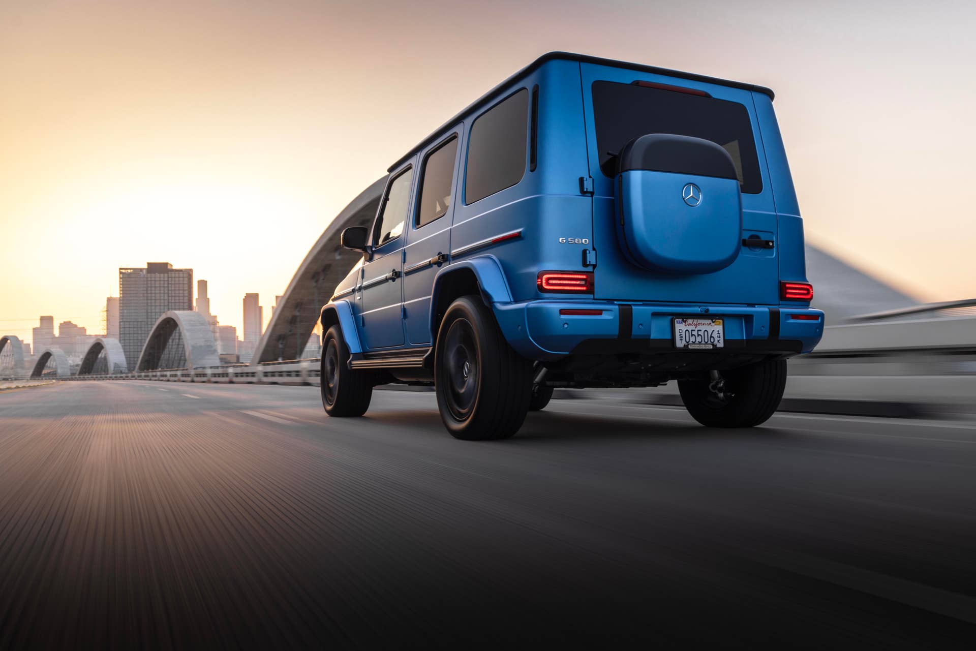2025-2026 Mercedes-Benz G-Class EV in blue low rear angled view
