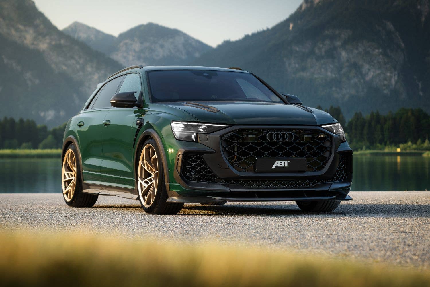 ABT RSQ8-LE 1000 front three-quarter view with matte carbon body kit and gold wheels
