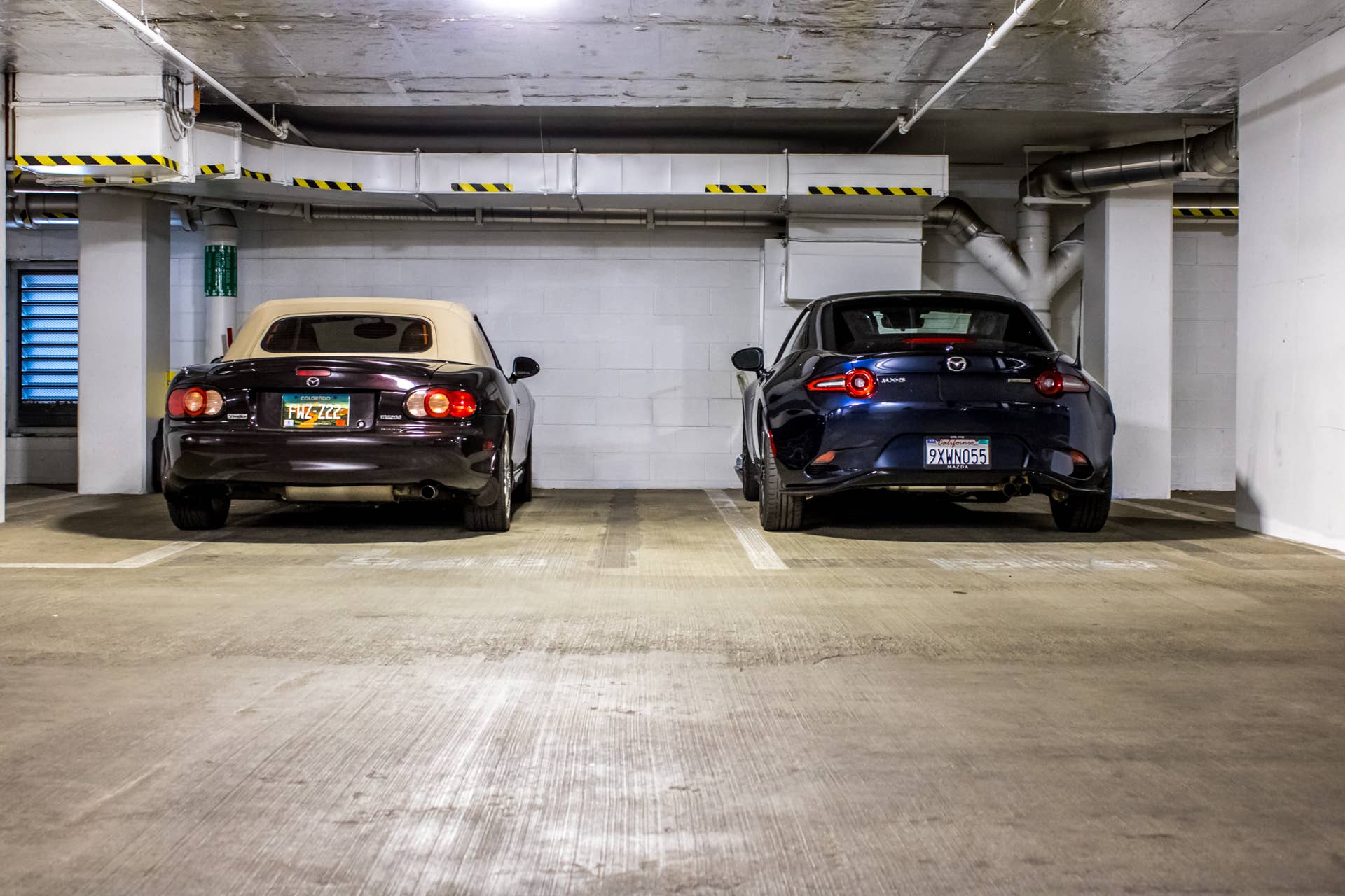 2026 Mazda MX-5 Miata RF and 2004 Mazda Miata