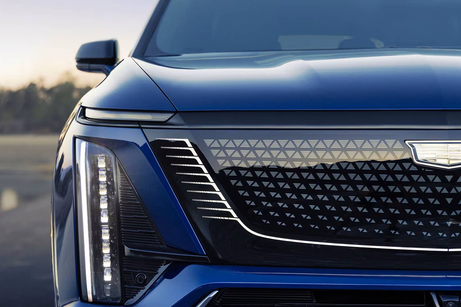 2027 Cadillac Vistiq in blue front view closeup