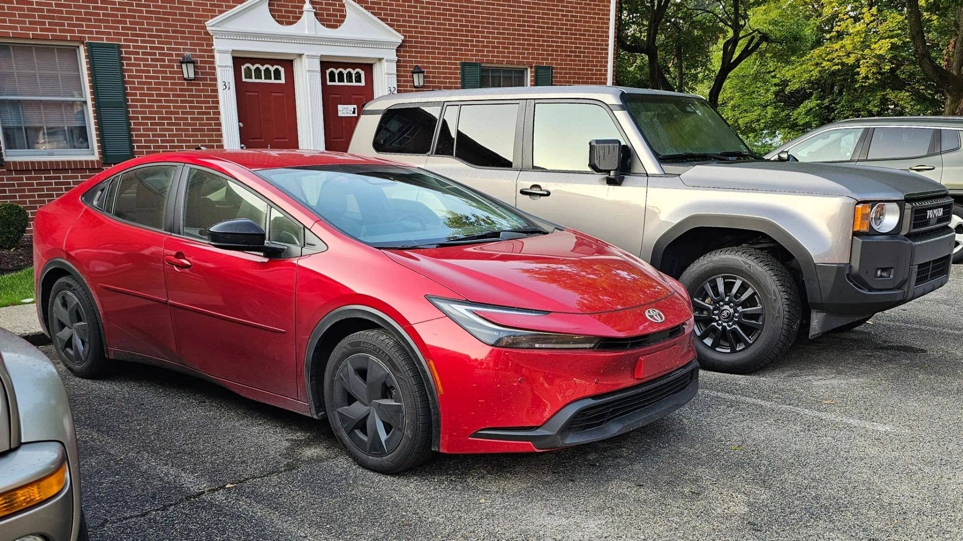Red 100,000-Mile 2026 Toyota Prius LE