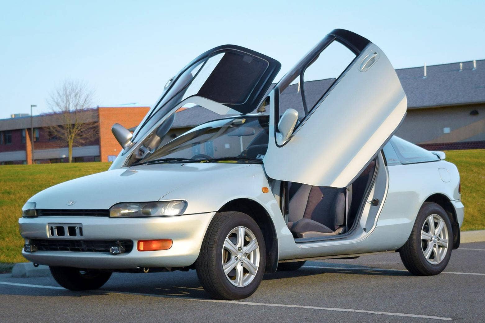 1995 Toyota Sera in silver front angled view butterfly doors open