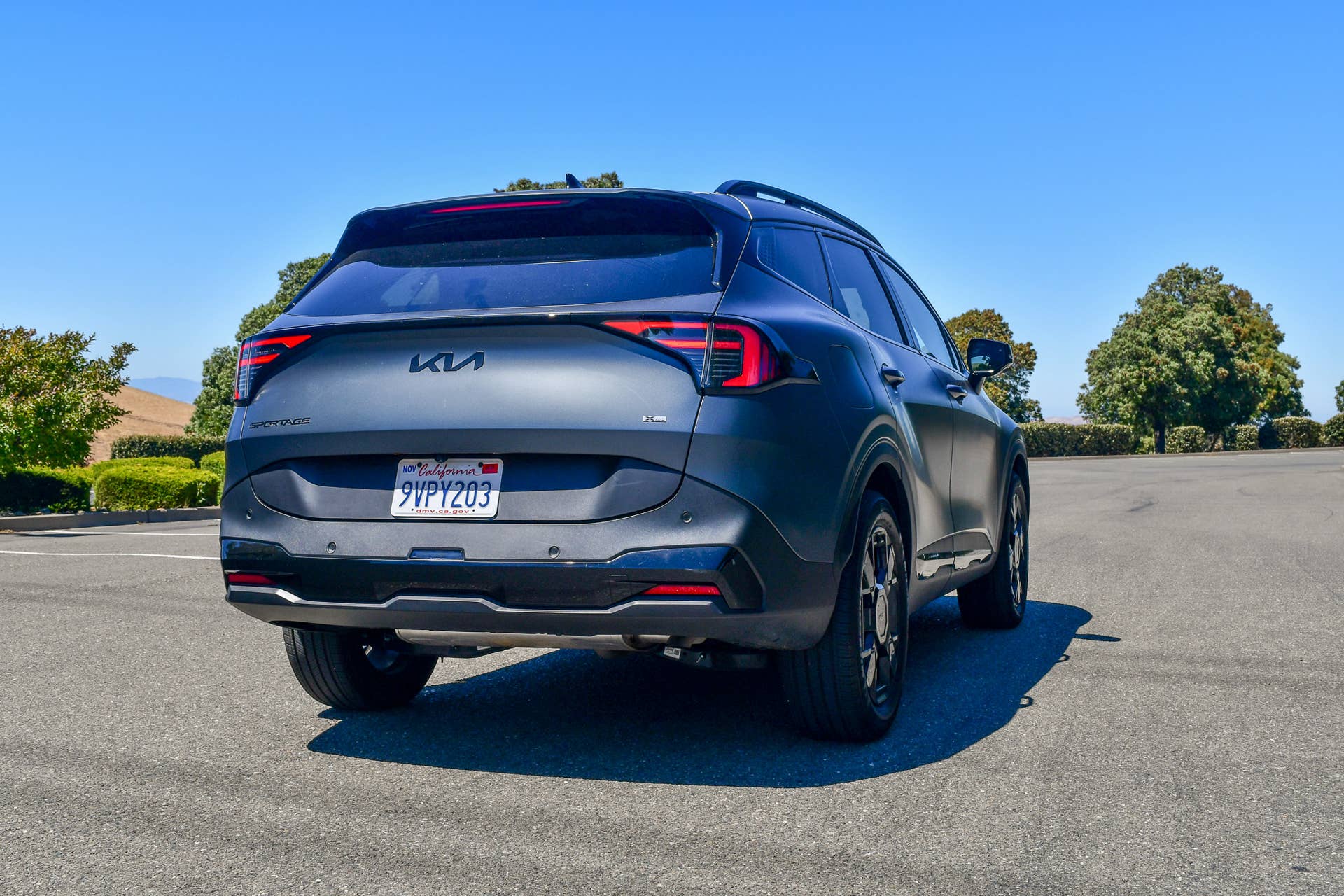 The rear quarter end of the 2026 Kia Sportage X-Line SX Prestige PHEV