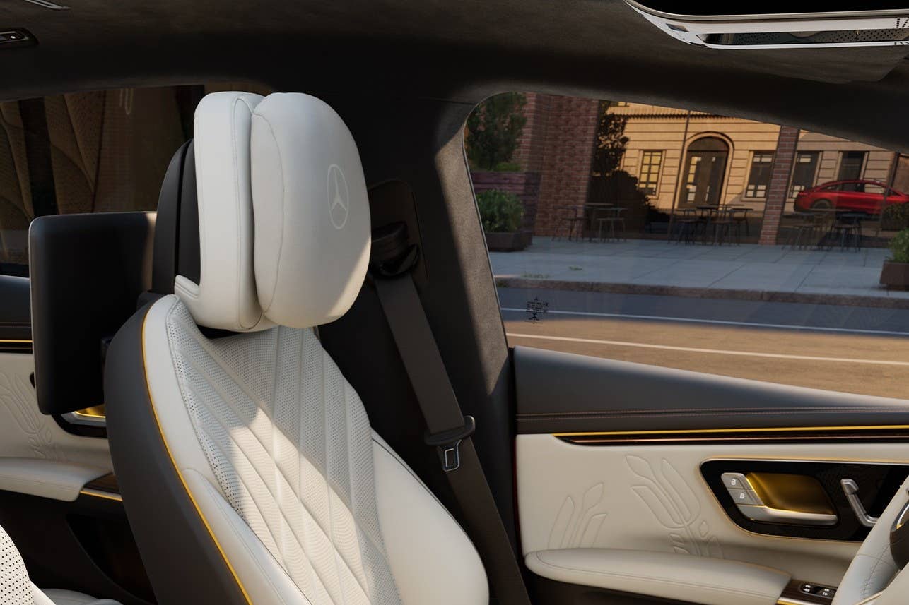 2027 Mercedes-Benz EQS with beige interior headrest pillow