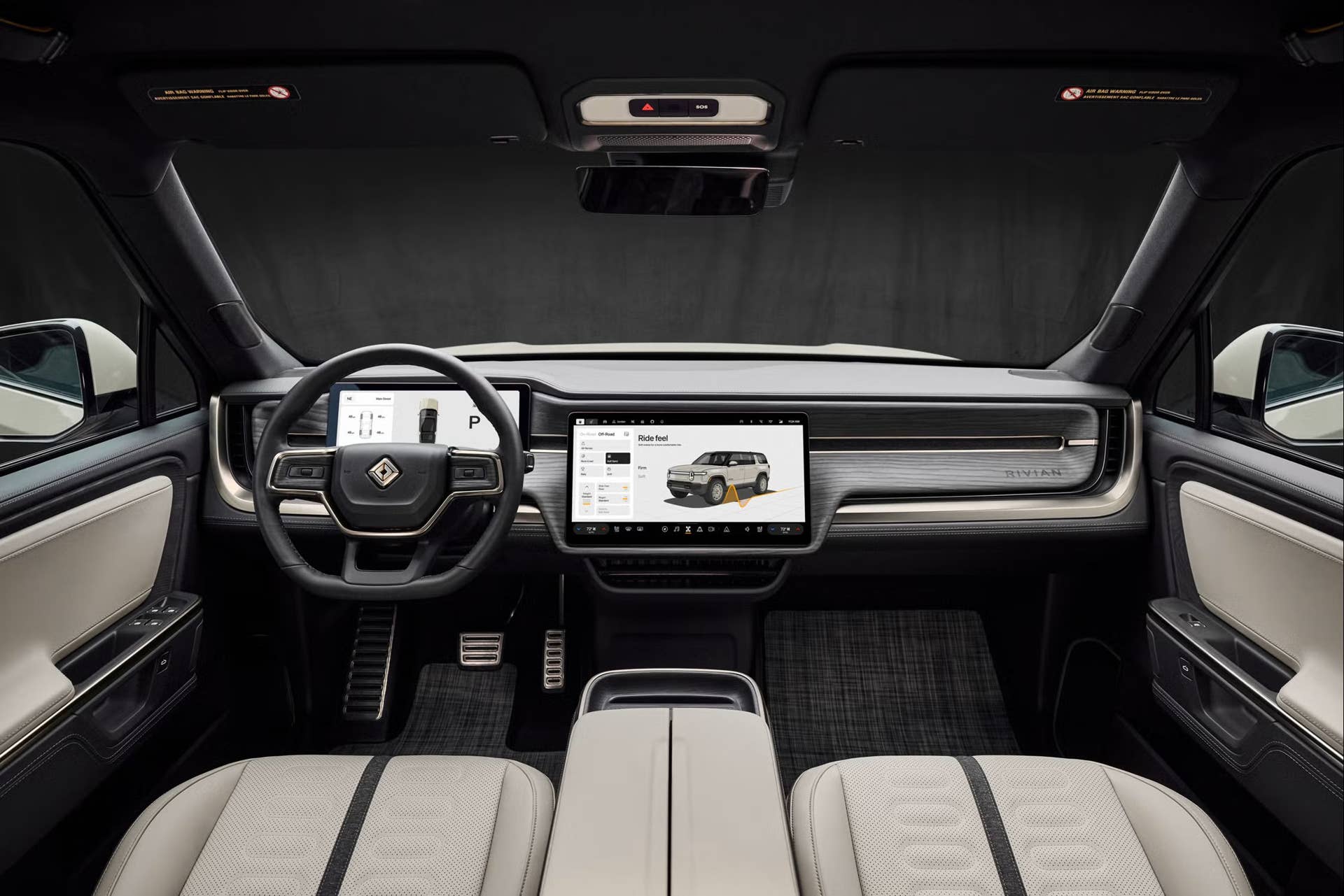 2025 Rivian R1S California Dune Edition Black Mountain and Sandstone interior front cabin