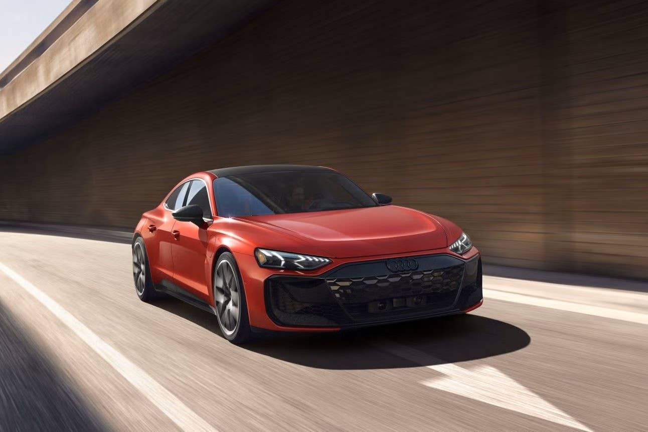 2027 Audi RS e-tron GT Performance in Progressive Red front angled view driving