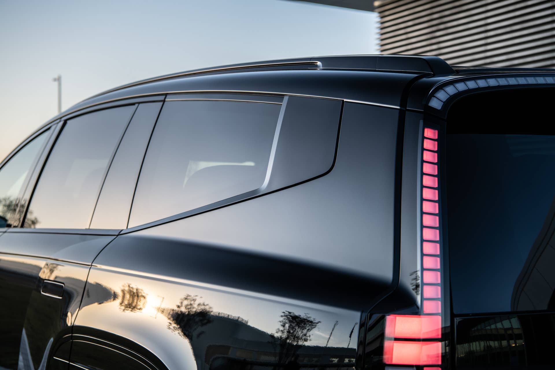 2027 Hyundai Ioniq 9 Calligraphy Black Ink in Abyss Black Pearl rear angled view closeup