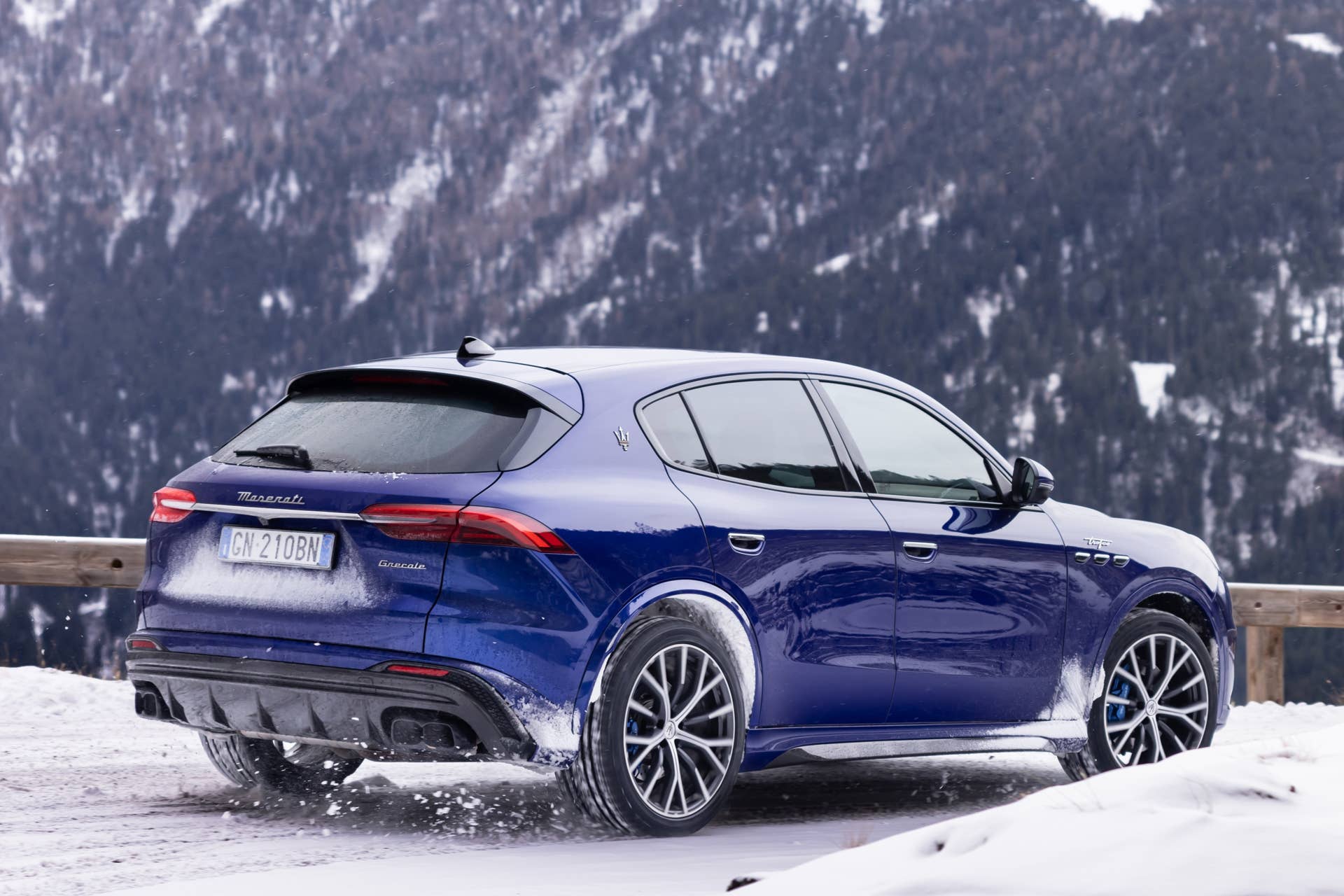 2025 Maserati Grecale in Blu Intenso rear angled view snow driving