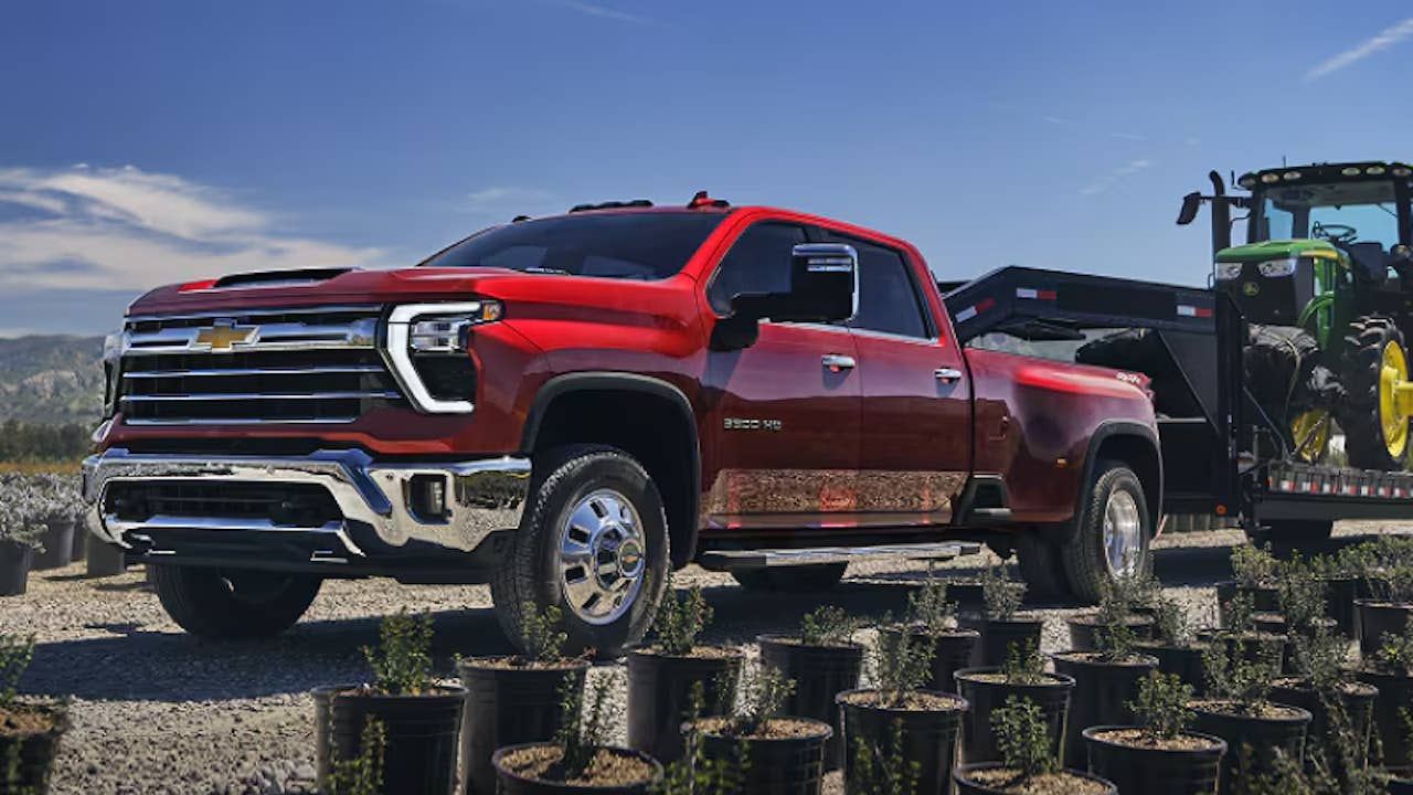 2027 Chevrolet Silverado HD in red front angled view