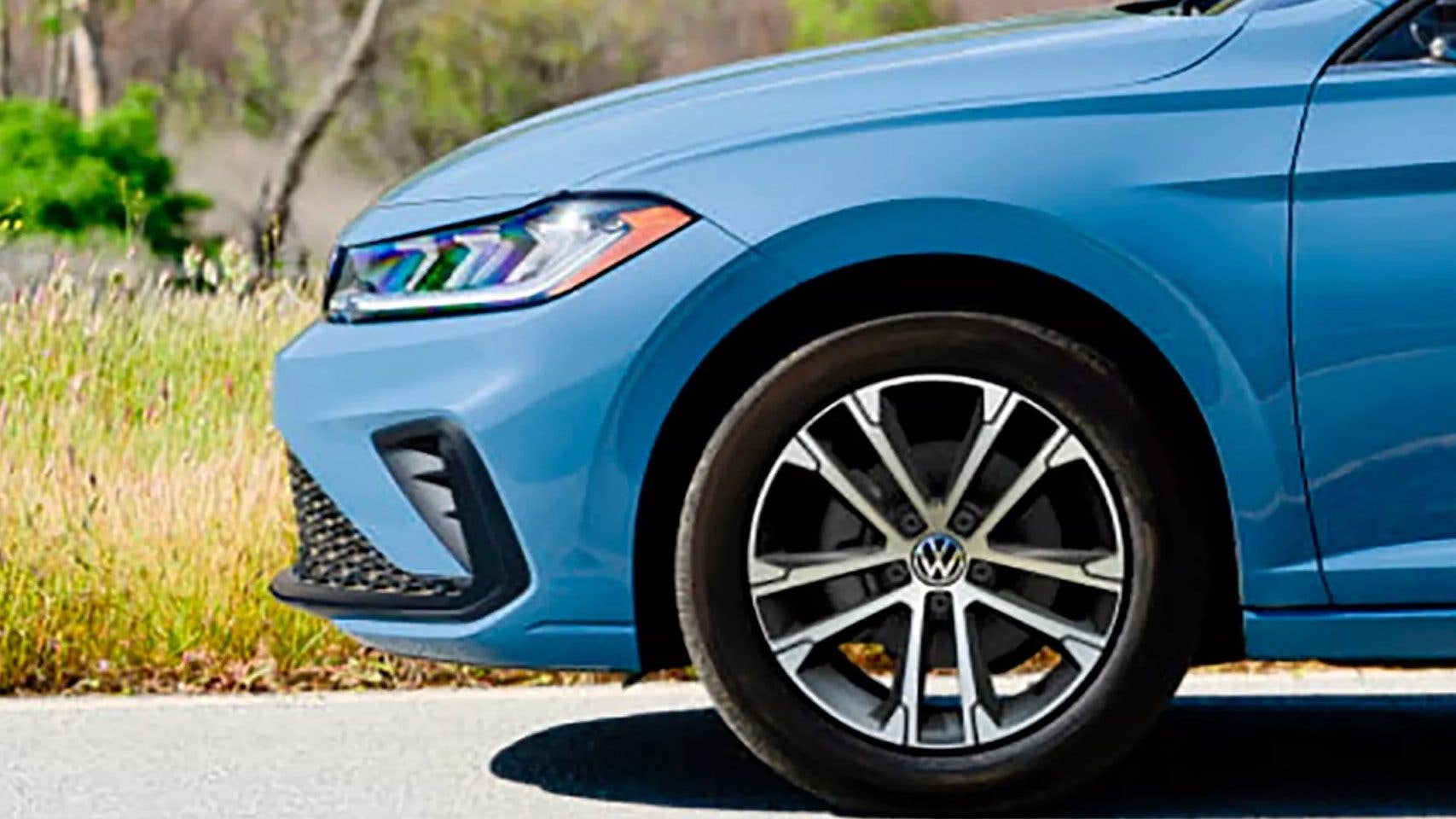 2025-2026 Volkswagen Jetta Sport in Monterey Blue Pearl front side view