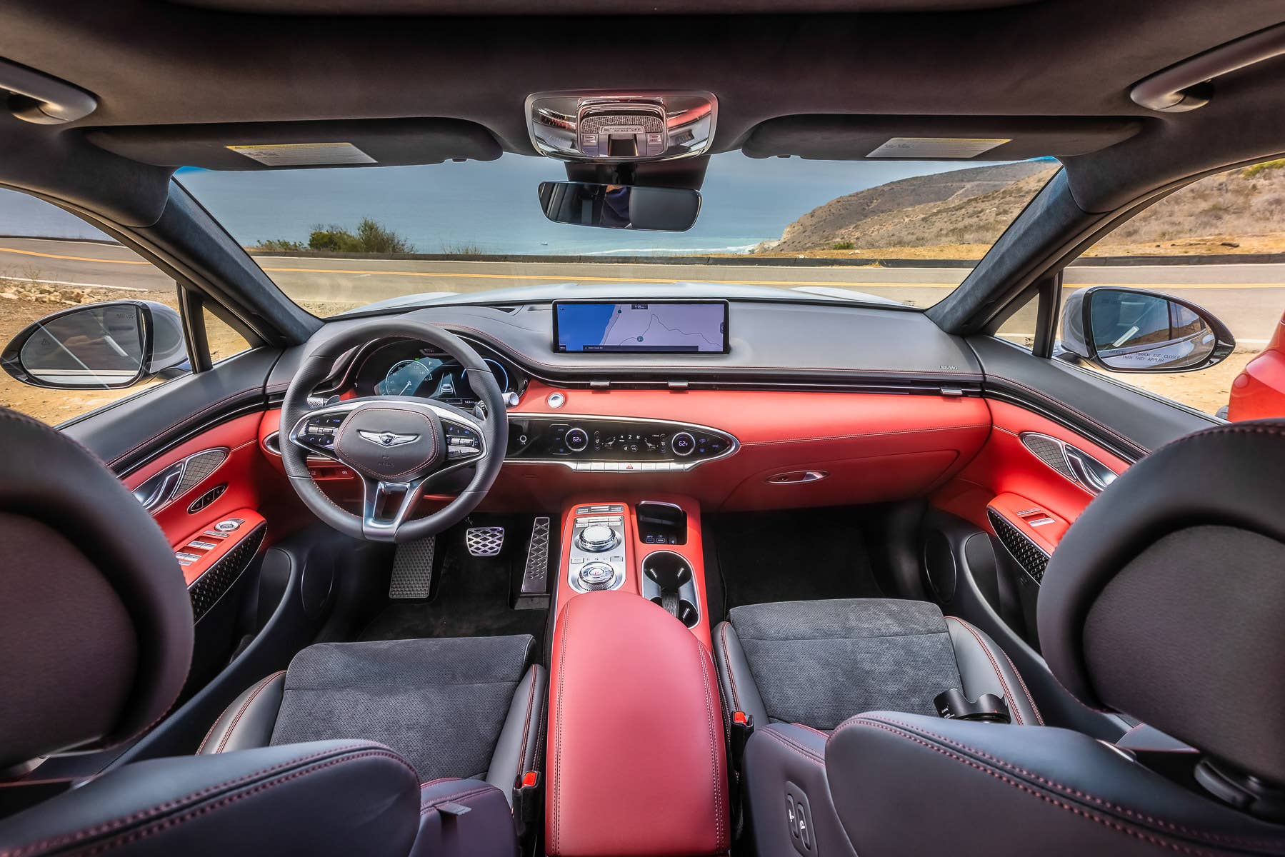2025 Genesis GV70 with black and red interior front cabin