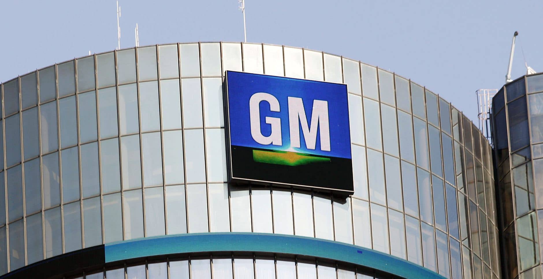 DETROIT, MI - SEPTEMBER 17: The General Motors logo on the world headquarters building is shown September 17, 2015 in Detroit, Michigan. Mary Barra, Chief Executive Officer of General Motors, and Mark Reuss, President of GM North America, held an Employee Town Hall Meeting and a question & answer session with the news media today to discuss GM's $900 million settlement with the Justice Department over GM's ignition switch recalls. (Photo by Bill Pugliano/Getty Images)