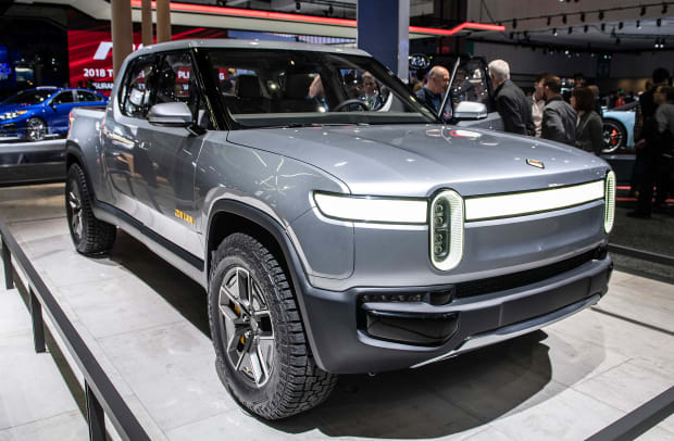 Ford invests 500 million in Rivian will develop EV on its platform Autoblog