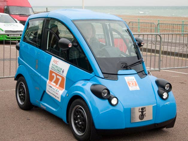 Spark 1/43 - Gordon Murray's T27 City Car 2012 - Bleu - Résine - Prévente