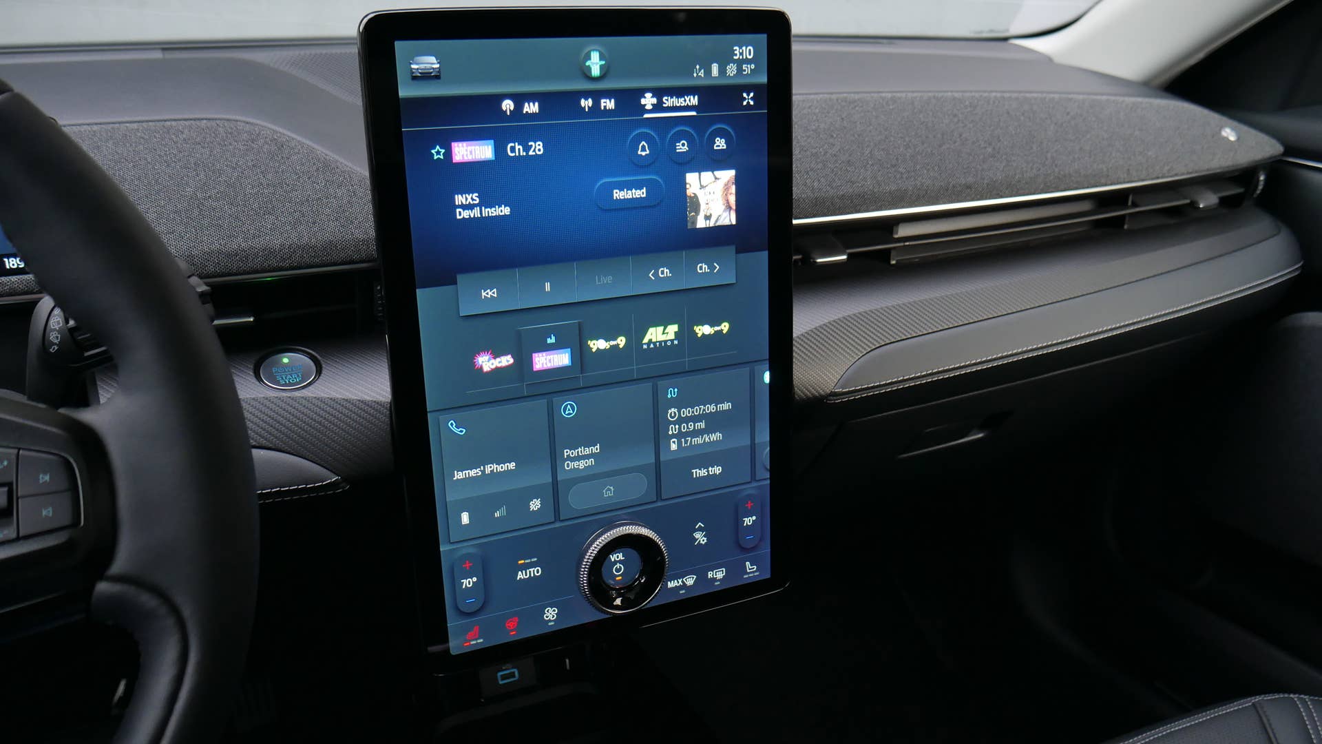 Ford SYNC 4 infotainment screen with navigation and smartphone connectivity