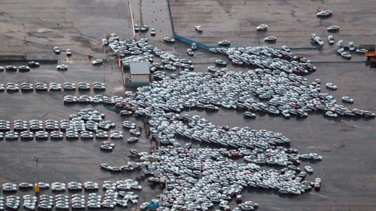Tsunami in Japan destroys fleet of cars ready for shipping