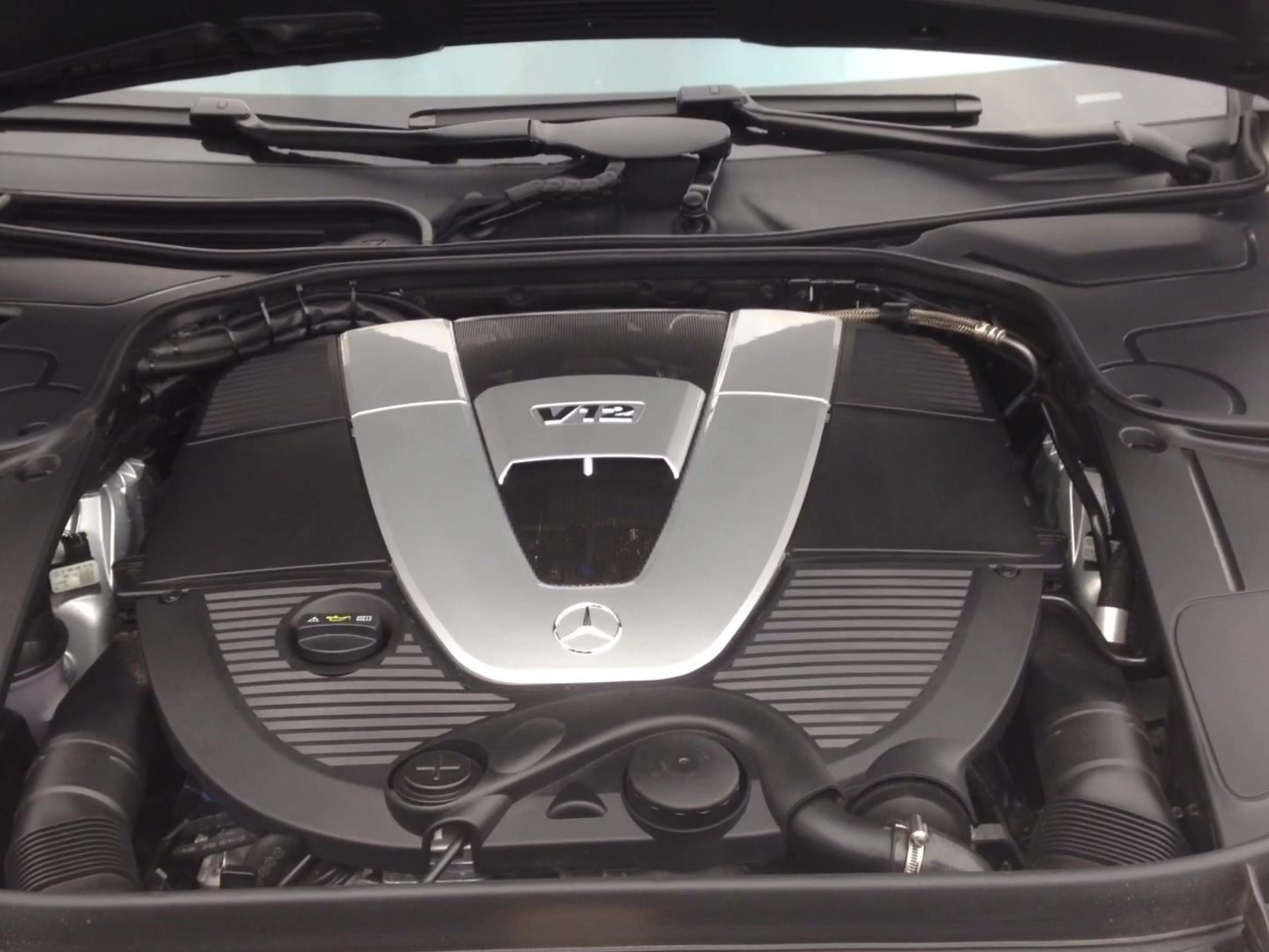 Greg Migliore listens to the roar of the 2016 Mercedes-Maybach S600’s V12 engine.