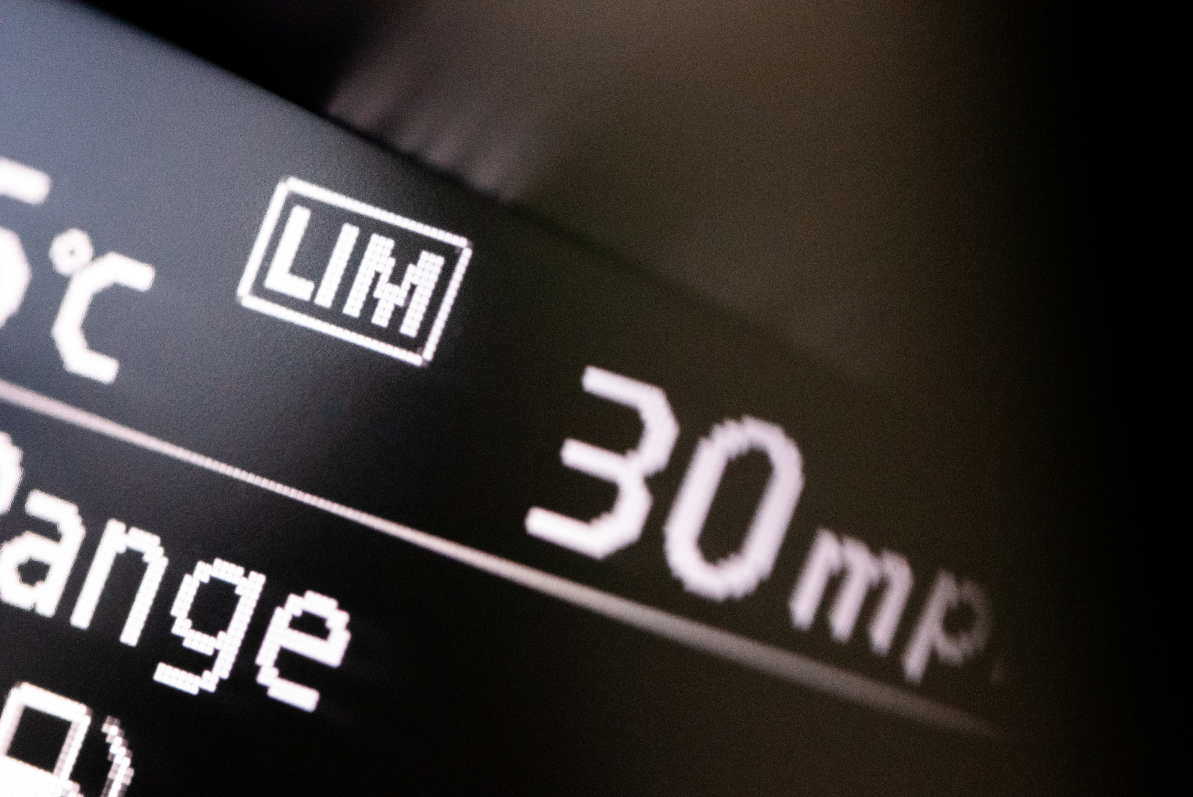 Speed Limiters, close up of the buttons and dials in a car for the speed limiting technology, Intelligent Speed Assistance (ISA) that will come into EU law in 2022