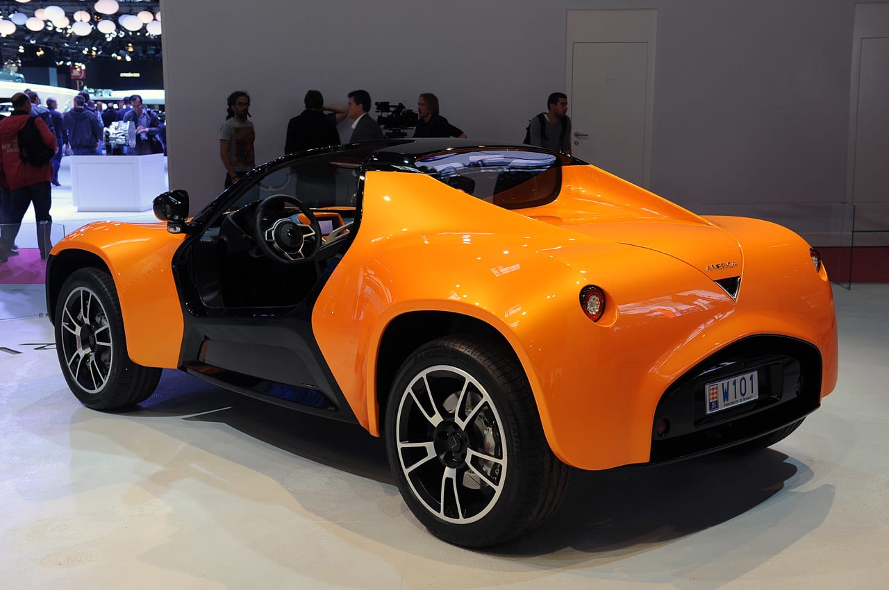 Véhicule électrique présenté en illustration complémentaire, mettant en avant un design moderne et innovant