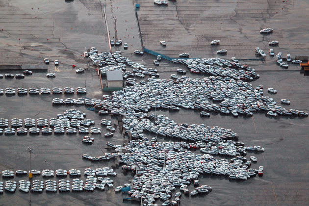 Tsunami in Japan destroys fleet of cars ready for shipping