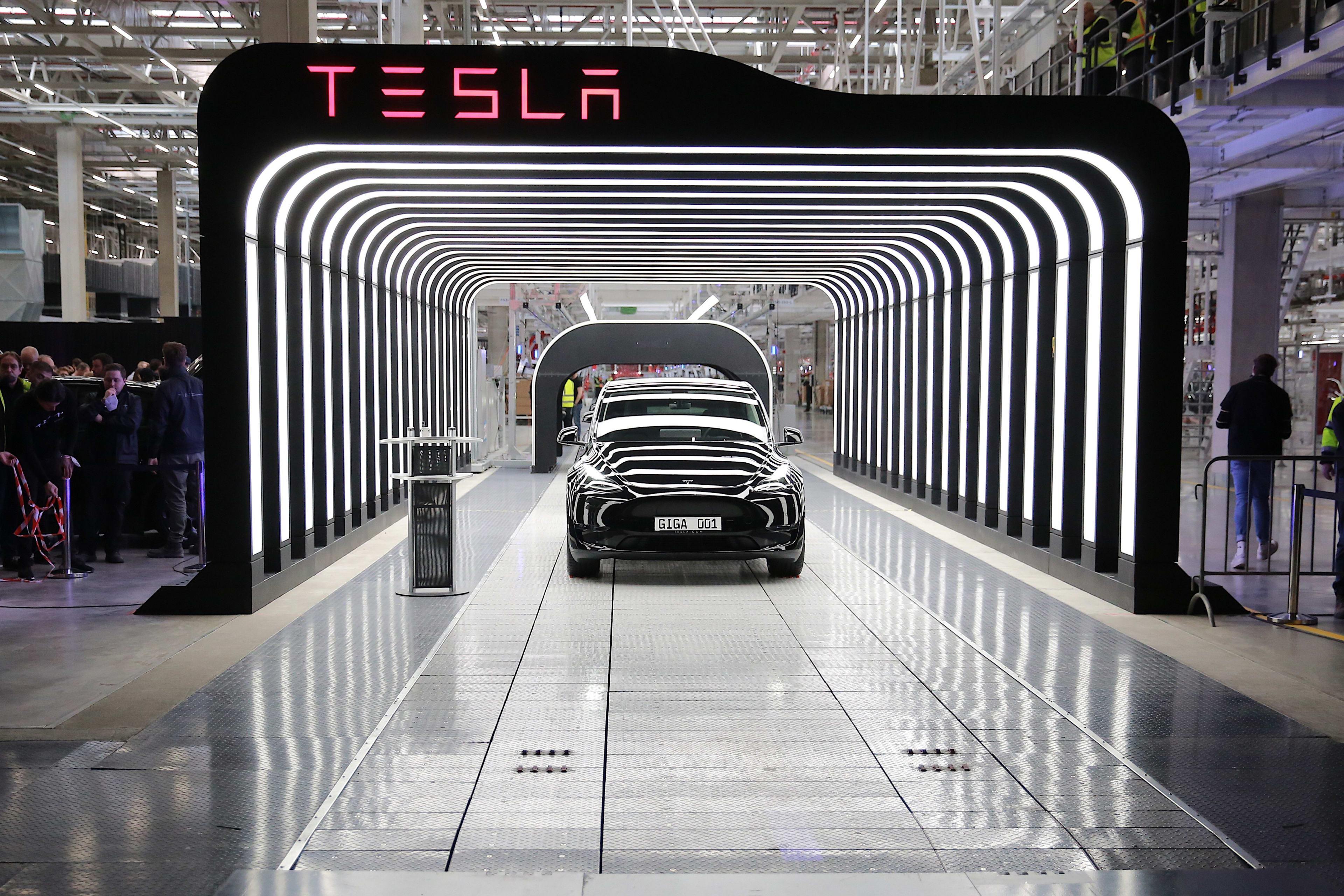 Newly completed Tesla electric cars at the official opening of the new Tesla electric car manufacturing plant on March 22, 2022 near Gruenheide, Germany