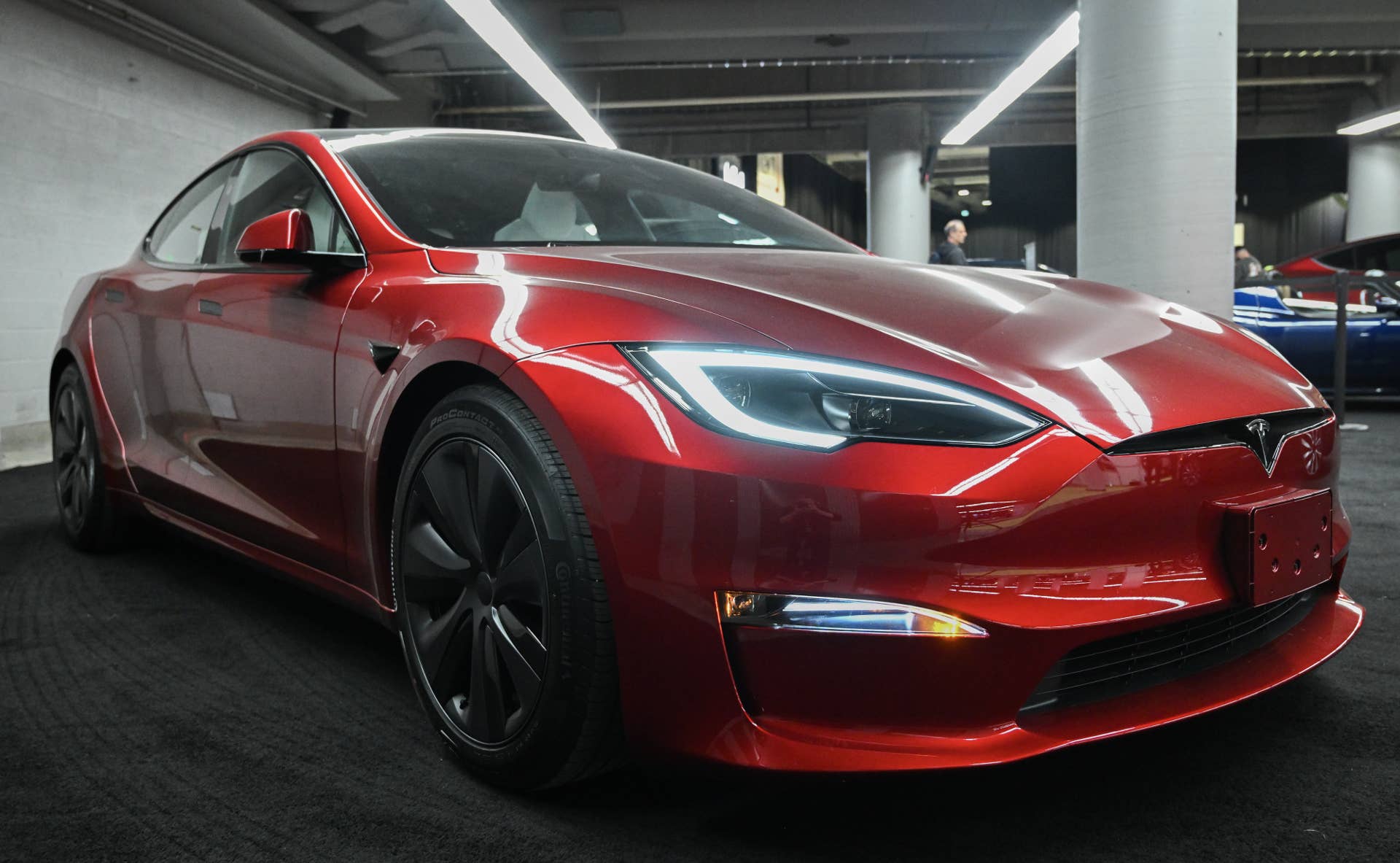 A Tesla Model S during the Montreal Electric Vehicle Show in Montreal, Quebec, Canada, on Friday, April 19, 2024. Prime Minister Justin Trudeau is offering more tax breaks to automotive firms to put their electric vehicle factories in Canada, as companies including Honda Motor Co. and Toyota Motor Corp. consider lucrative new investments. Photographer: Graham Hughes/Bloomberg via Getty Images