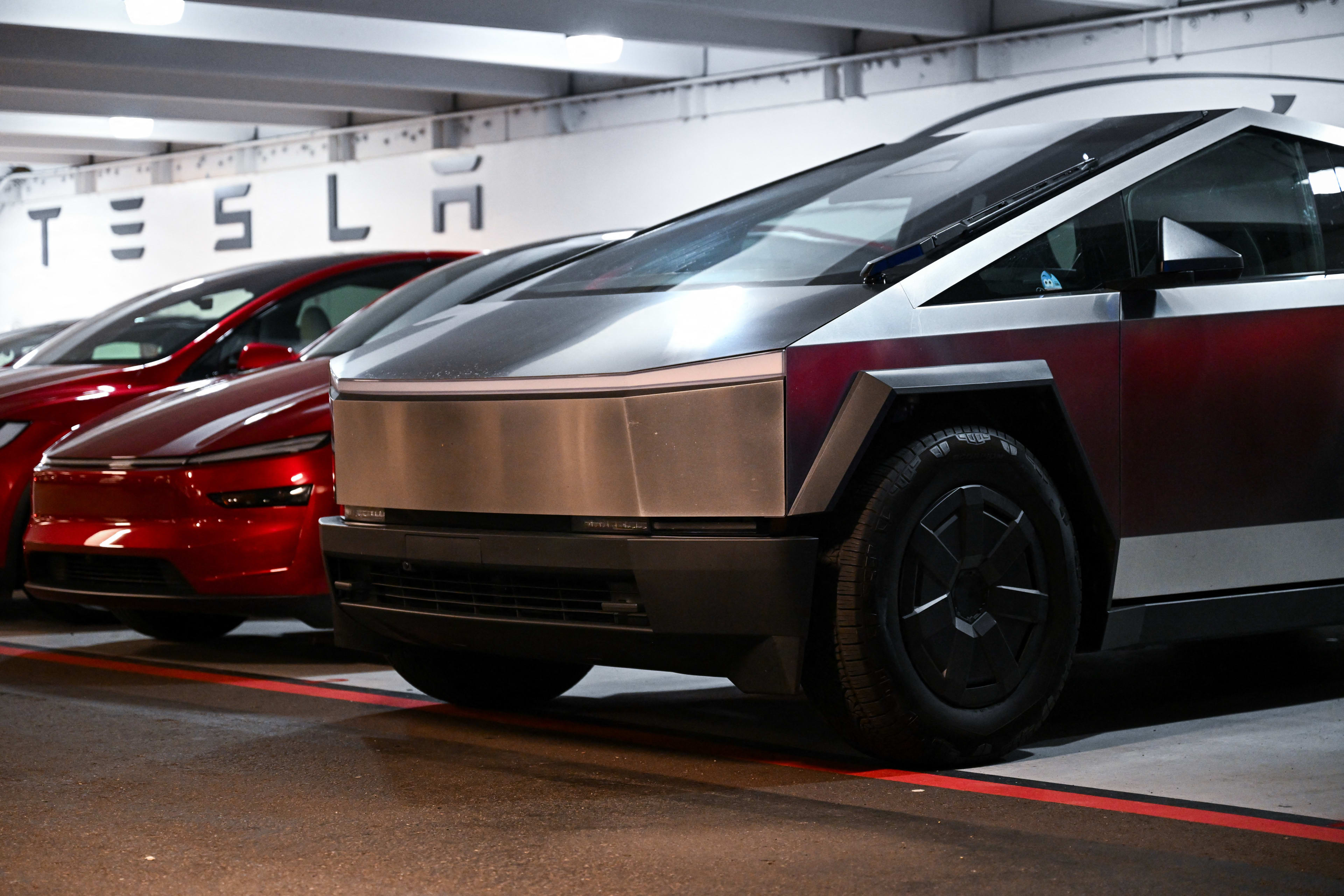 A Tesla Cybertruck and Model Y Juniper