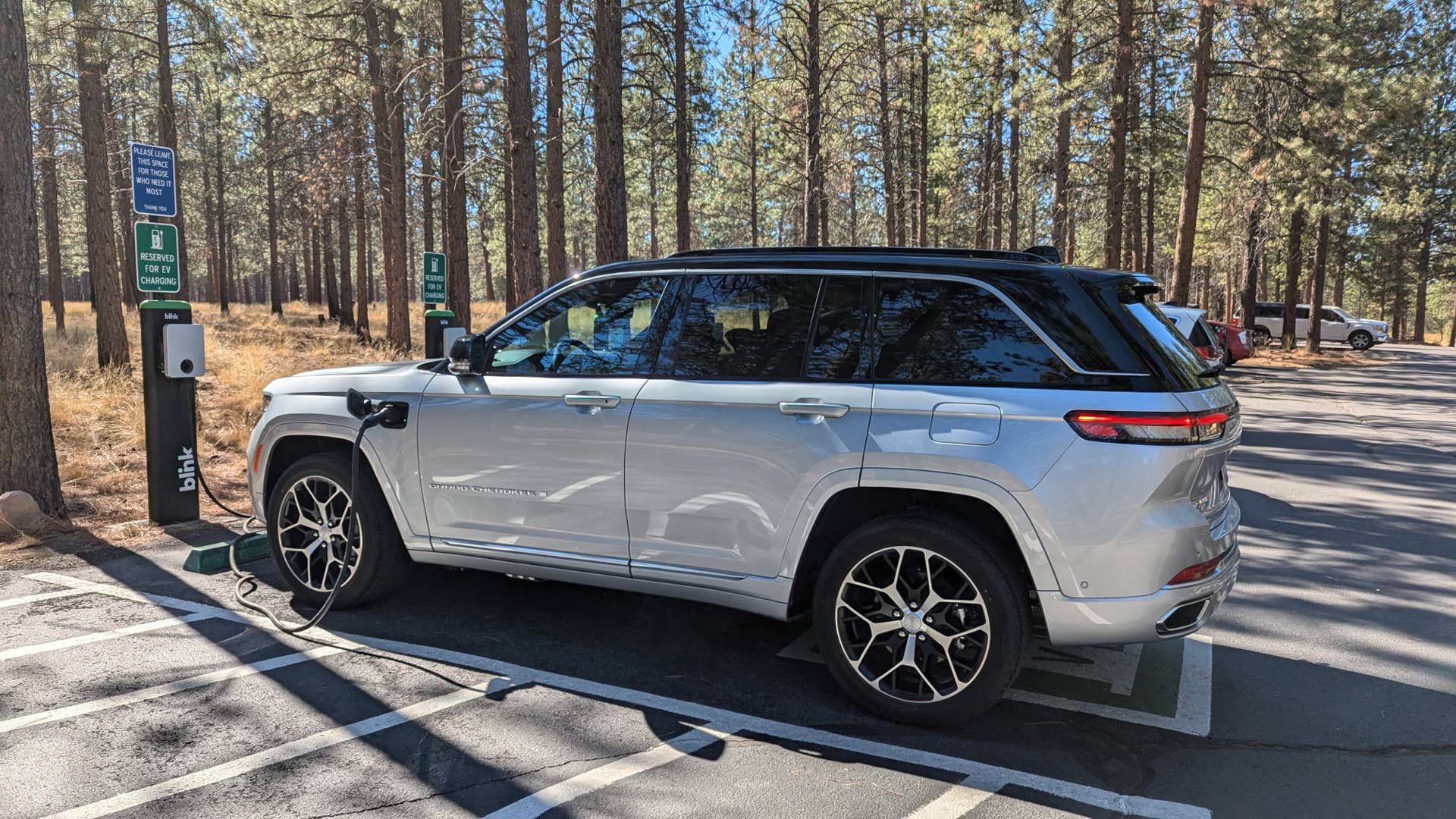 2025 Jeep Grand Cherokee 4xe navigating off-road terrain during a test drive