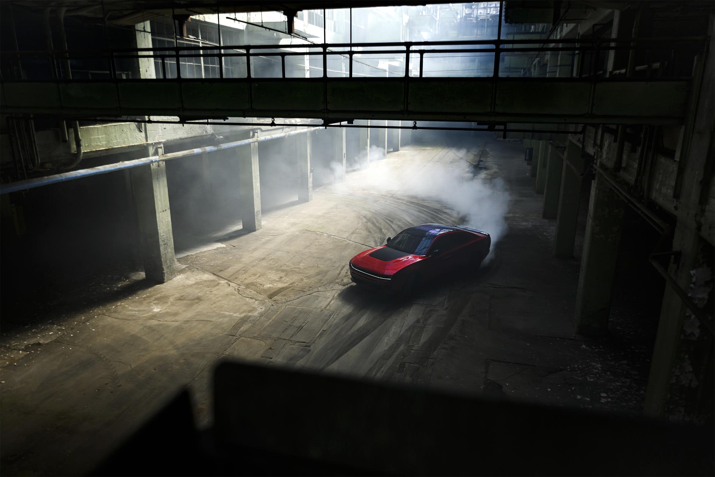 V8 Dodge Charger Comeback: CEO Hints HEMI Could Return to Battle Ford 4 dodge charger sixpack inside burning rubber