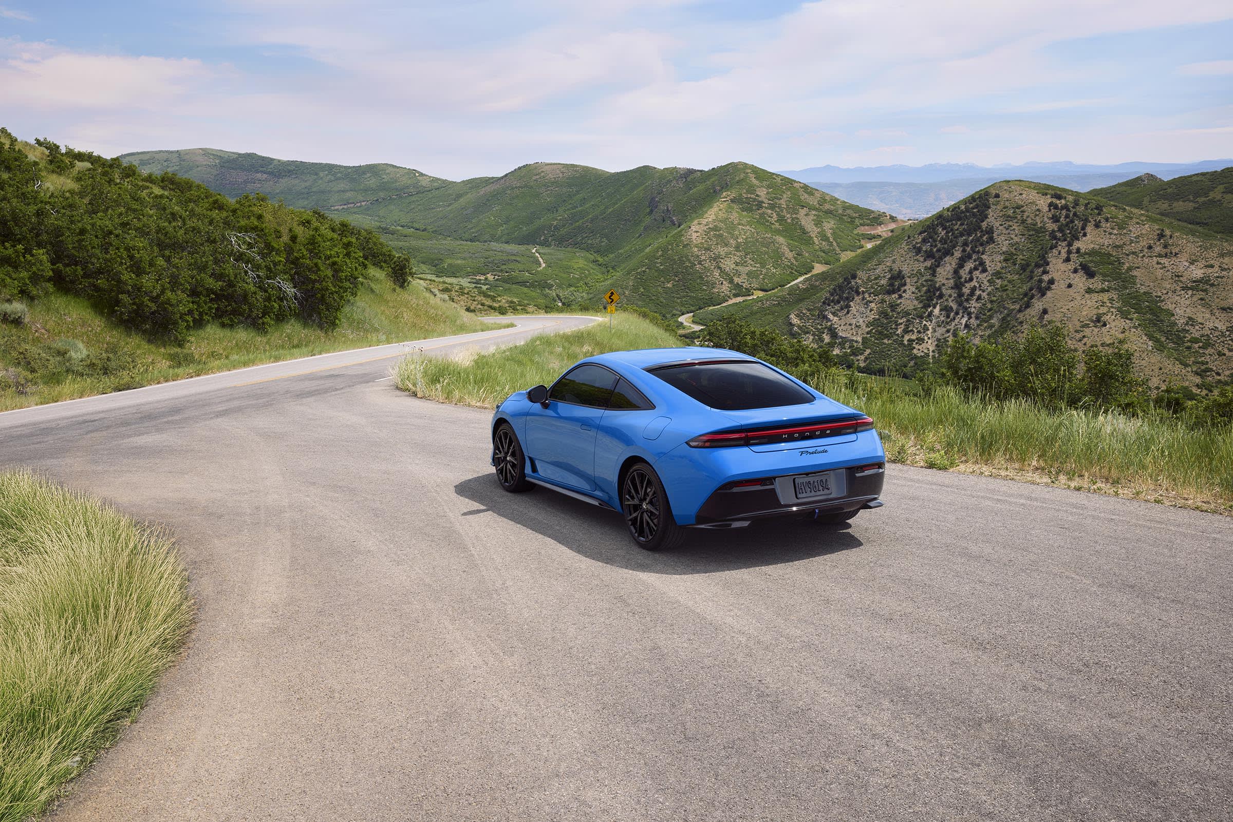 Honda Accidentally Revived Prelude –How an Accident Became a Hybrid Icon 3 2026 honda prelude driving in country rear 3 4