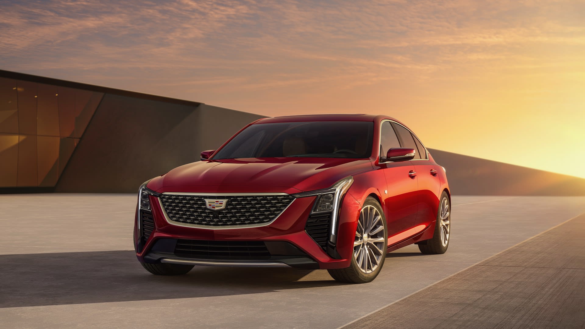 Cadillac CT4 Dies, But CT5 Lives On with Gas-Powered Successor, Blackwing Hopes Reignited 3 Front 7/8 view of the 2026 Cadillac CT5 Premium Luxury in Radiant Red Tintcoat.