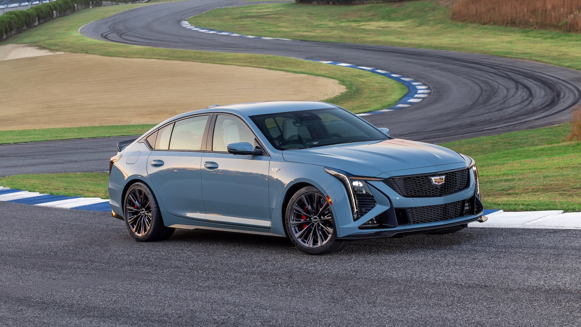Cadillac CT4 Dies, But CT5 Lives On with Gas-Powered Successor, Blackwing Hopes Reignited 5 Front 3/4 view of the 2026 Cadillac CT5-V Blackwing Precision Package in Drift Metallic static on-track.