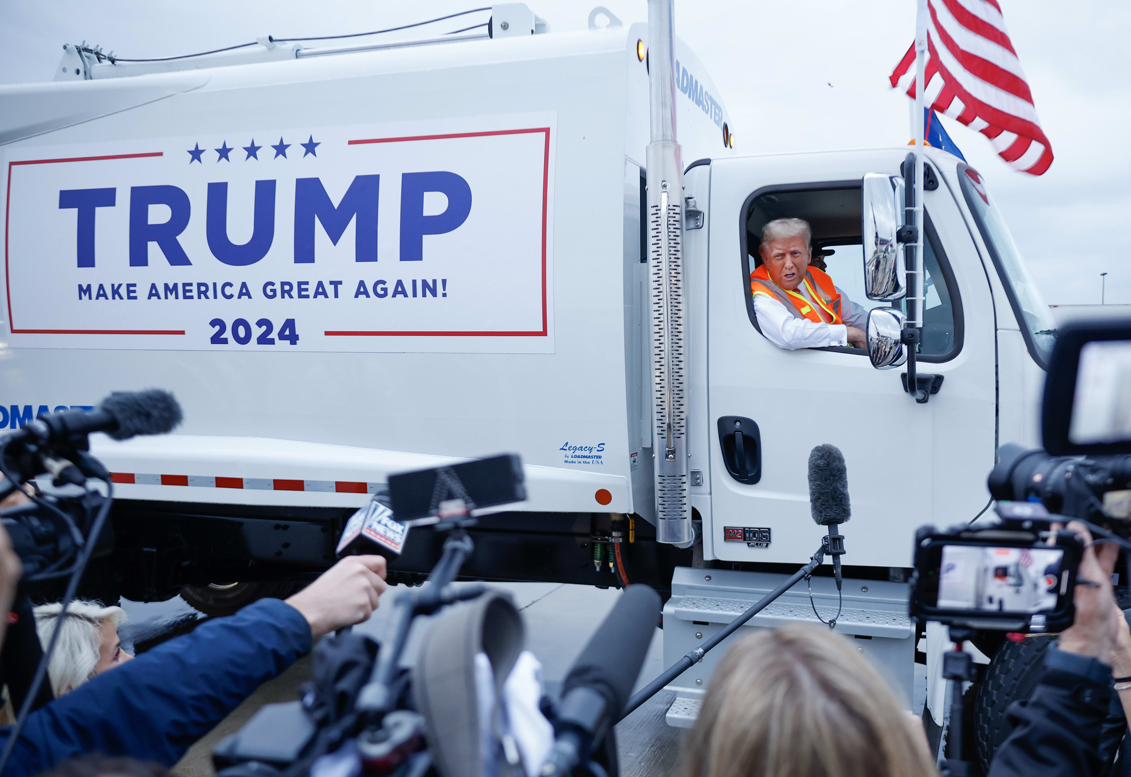 Trump's New 25% Large Truck Tariff Faces U.S. Opposition Over Allied Imports & Supply Chain Fears 3 Trump in a semi-truck on the campaign trail