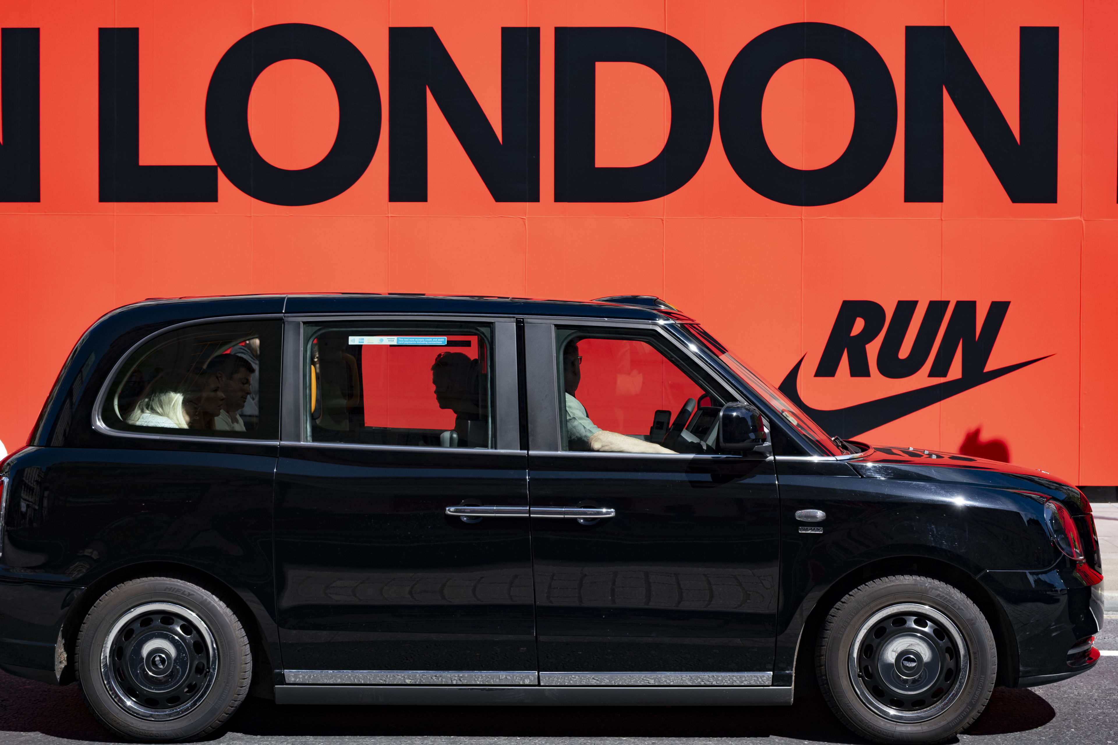 Waymo Targets London’s Black Cabs: Autonomous Ride-Hailing Service to Launch Next Year 5 red nike run hoarding london 974126