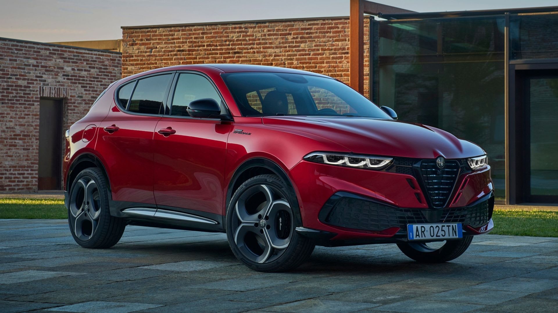 2026 MINI Oxford Edition Countryman Arrives As Brand’s Cheapest SUV, Starts at $34,900 5 Rosso Brera 2026 Alfa Romeo Tonale Sport Speciale Parked Front 3/4 View