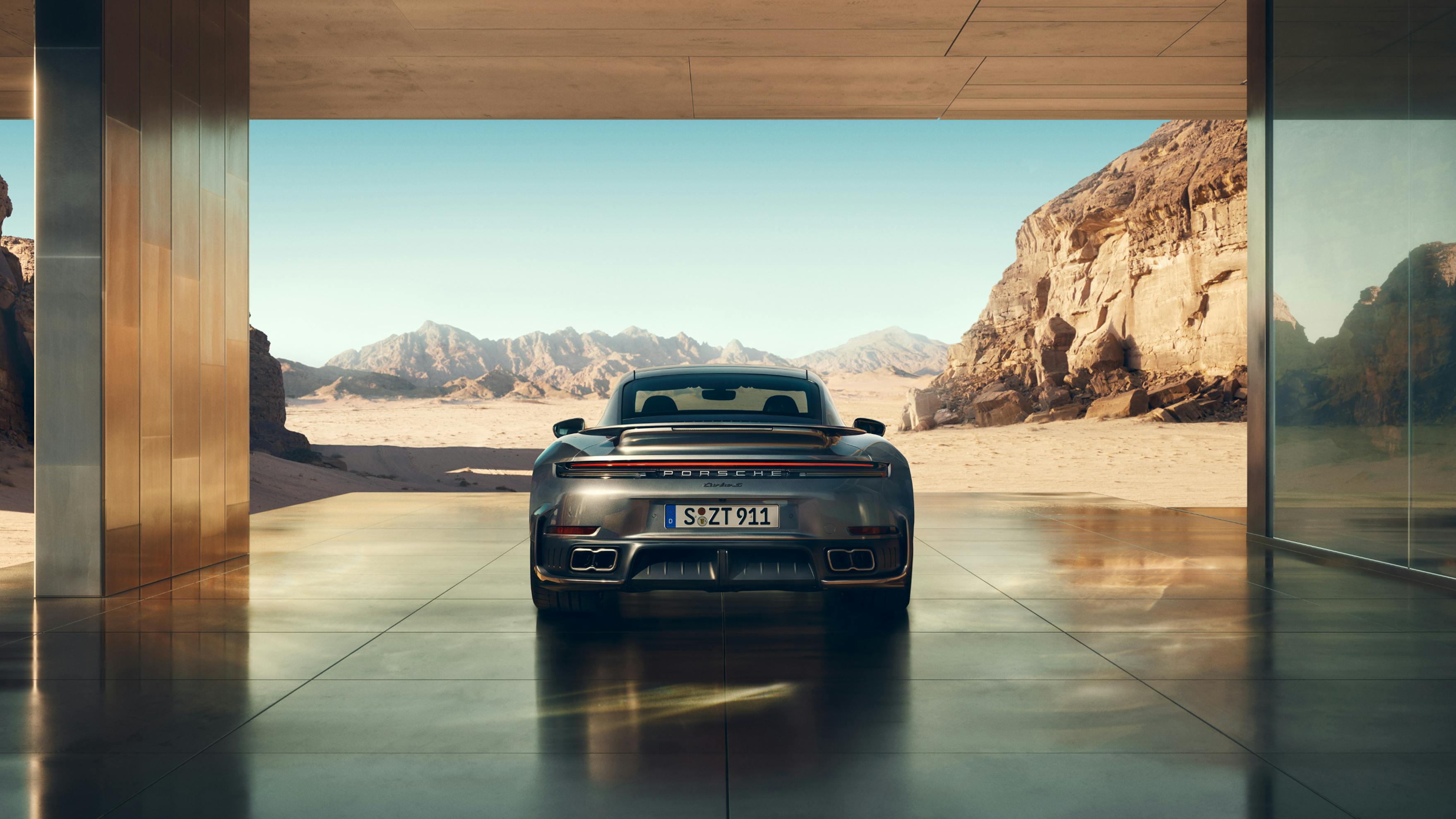 Rear view of the new Porsche 911 Turbo S with twin T-Hybrid turbos