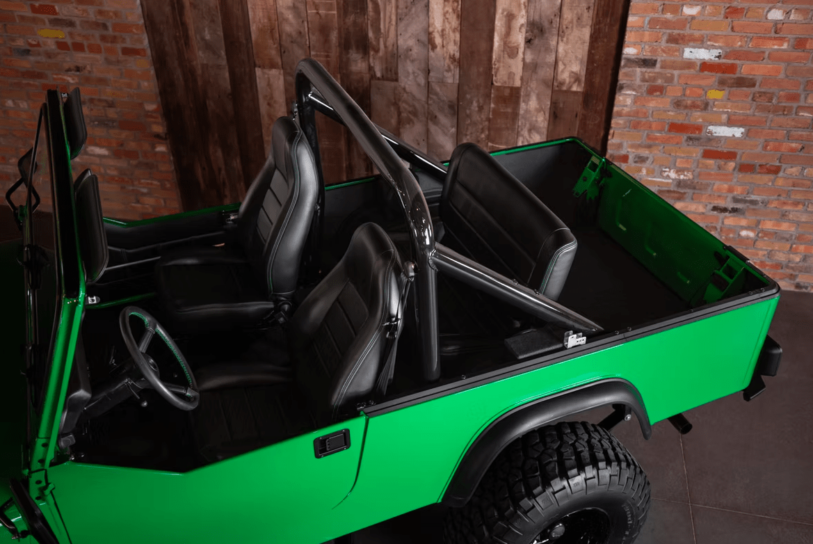 Jeep CJ-8 Scrambler Restomod by Blacksmith Garage: Python Green, Full Leather, Auction Oct 25 12 Jeep CJ-8 Scrambler ANV-JS2 Blacksmith Garage interior seats