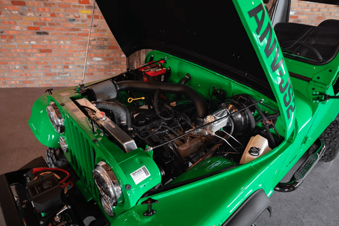 Jeep CJ-8 Scrambler Restomod by Blacksmith Garage: Python Green, Full Leather, Auction Oct 25 13 Jeep CJ-8 Scrambler ANV-JS2 Blacksmith Garage engine bay